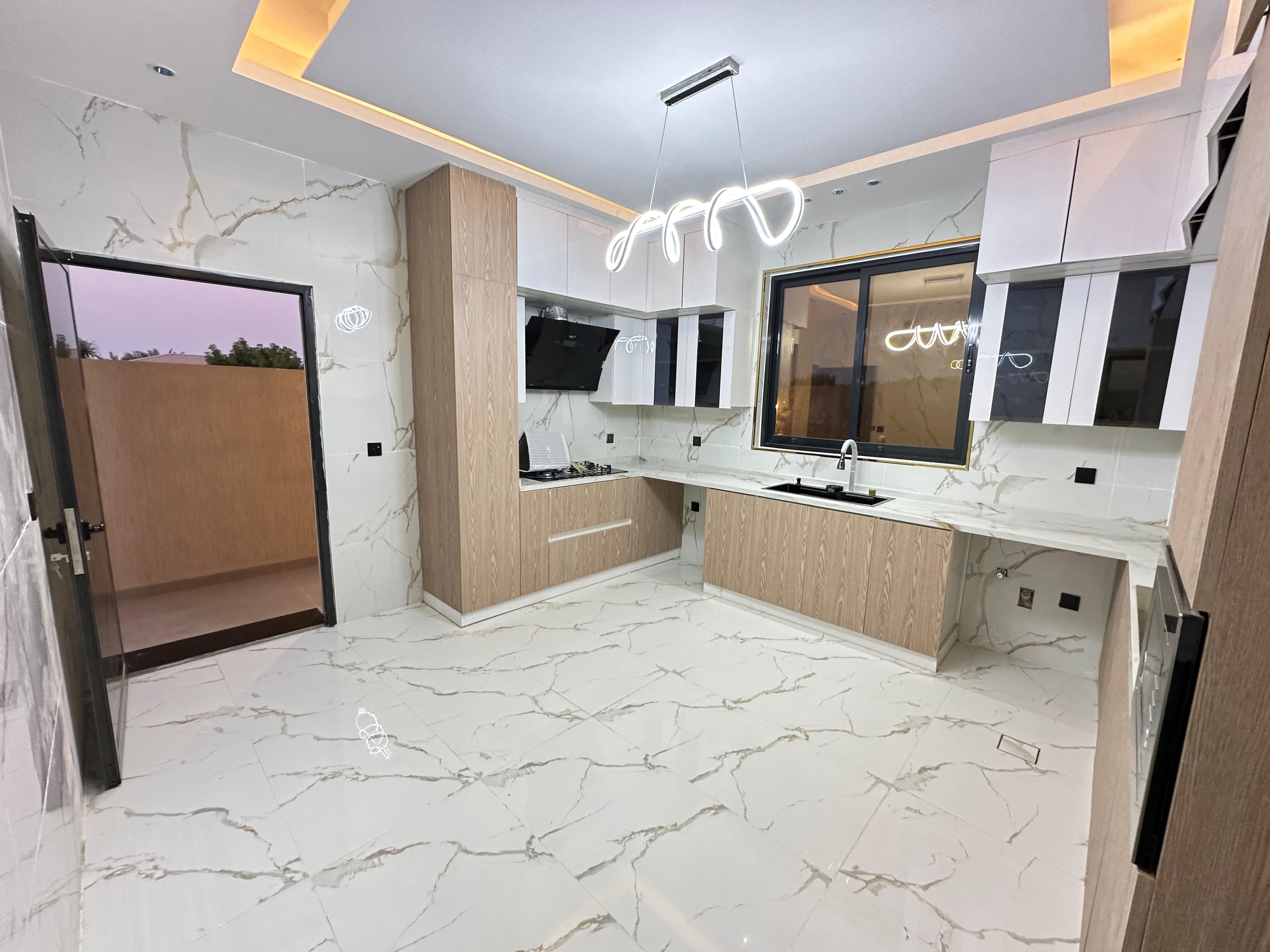 For sale: A distinctive villa with a full stone façade in the Al Zahia area. 7