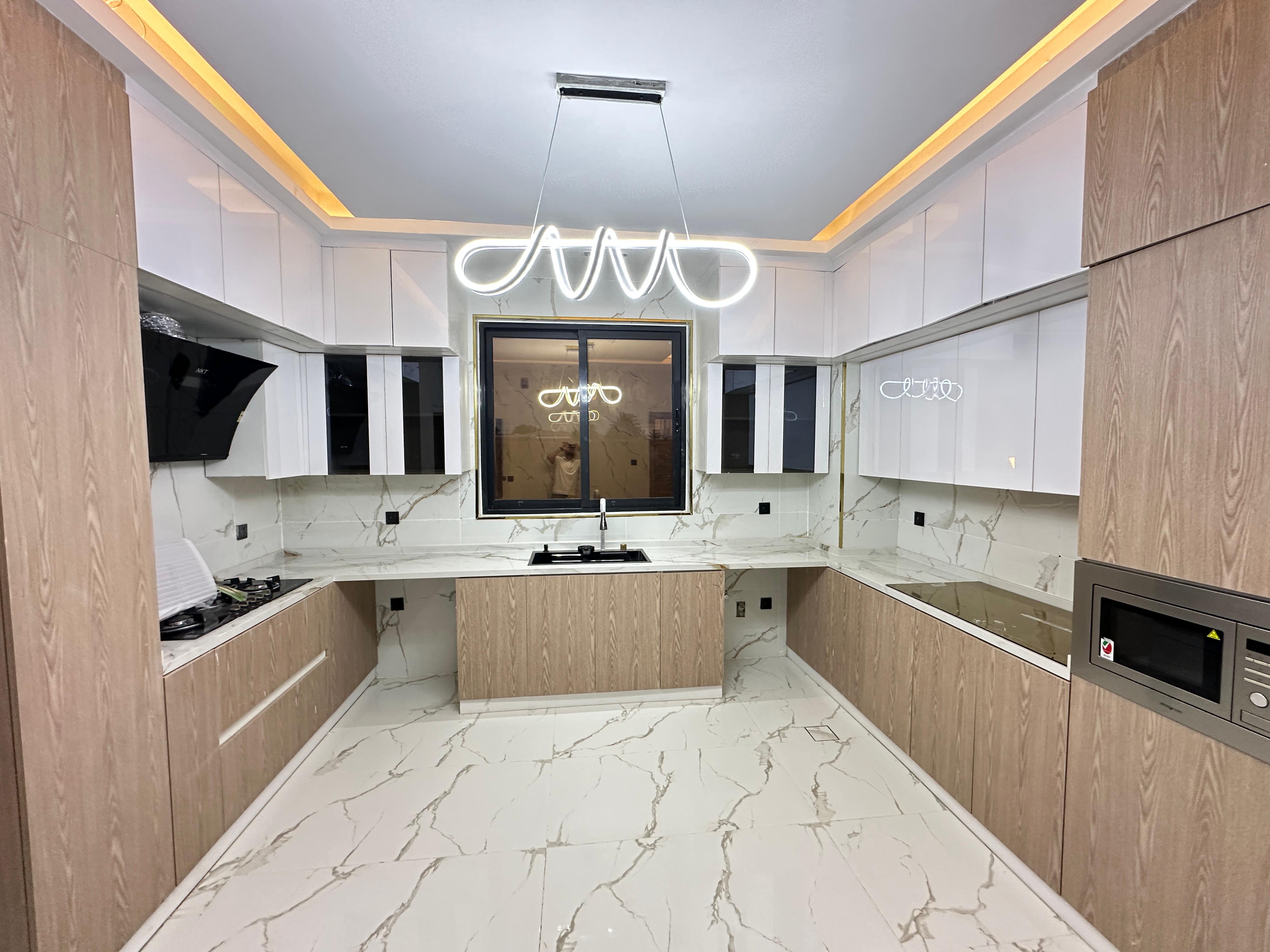 For sale: A distinctive villa with a full stone façade in the Al Zahia area. 9
