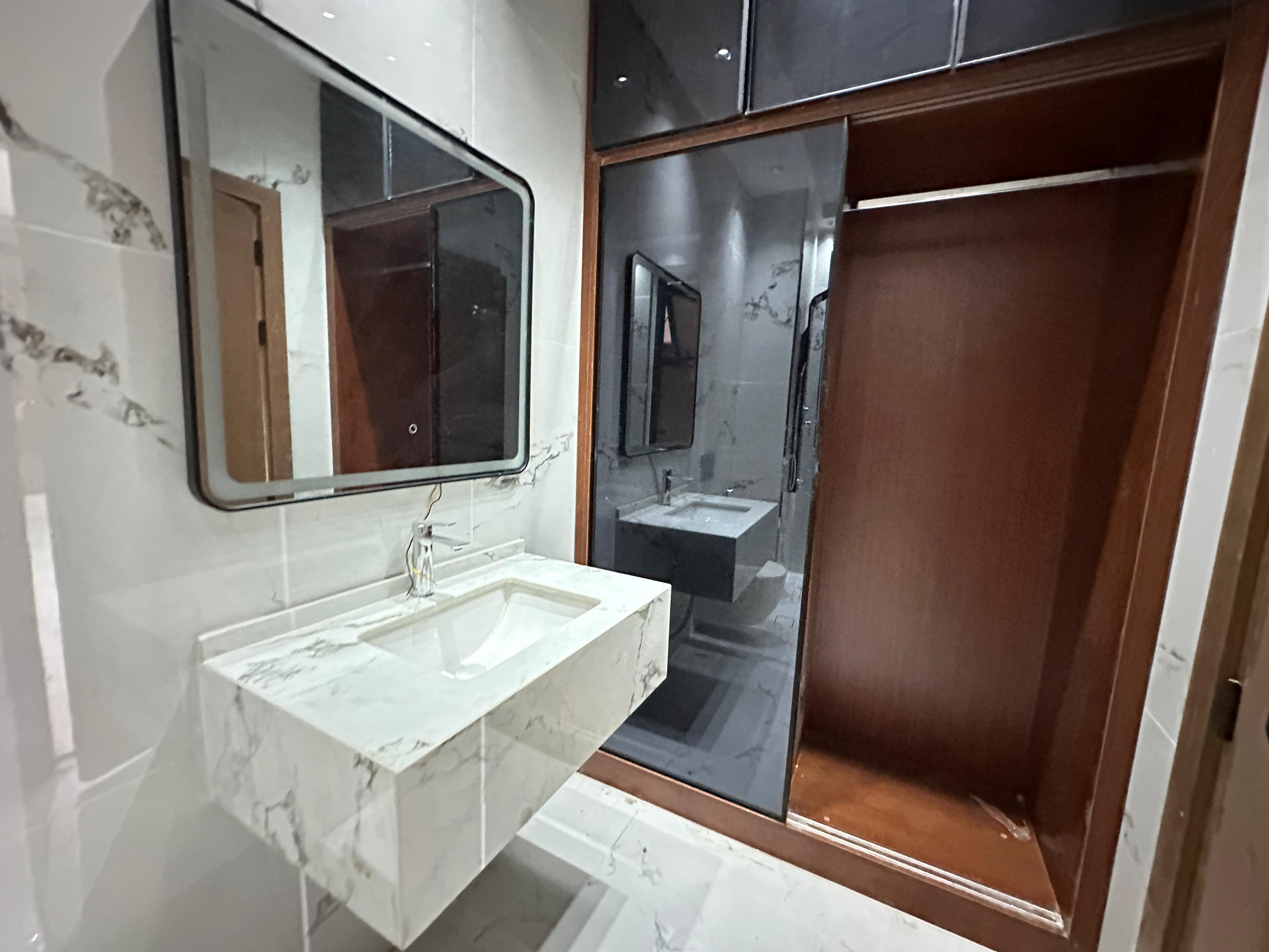 For sale: A distinctive villa with a full stone façade in the Al Zahia area. 12