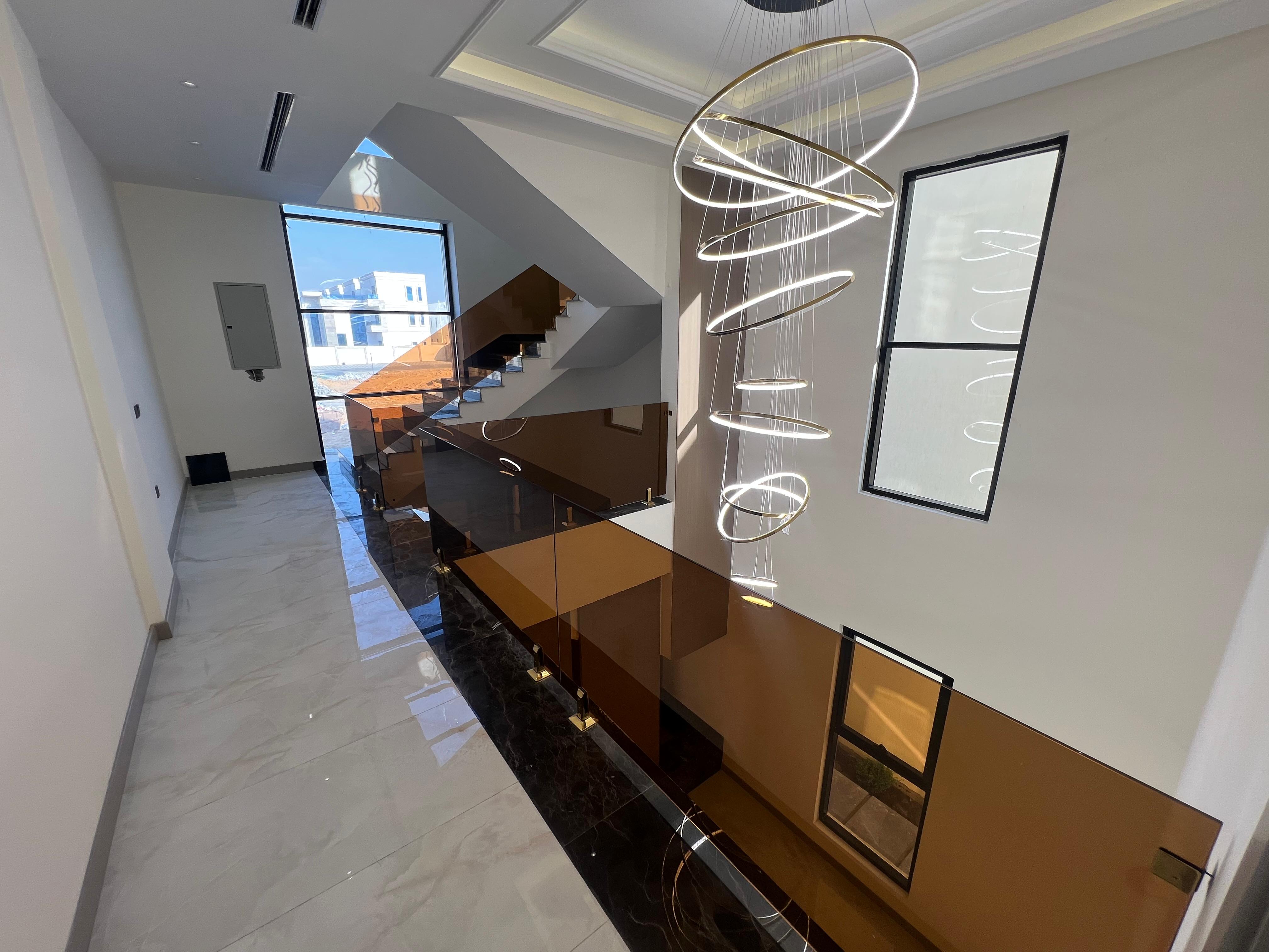 Luxury modern villa for sale in Al-Haliou area, 2 floors and a roof, including registration and ownership fees. 13