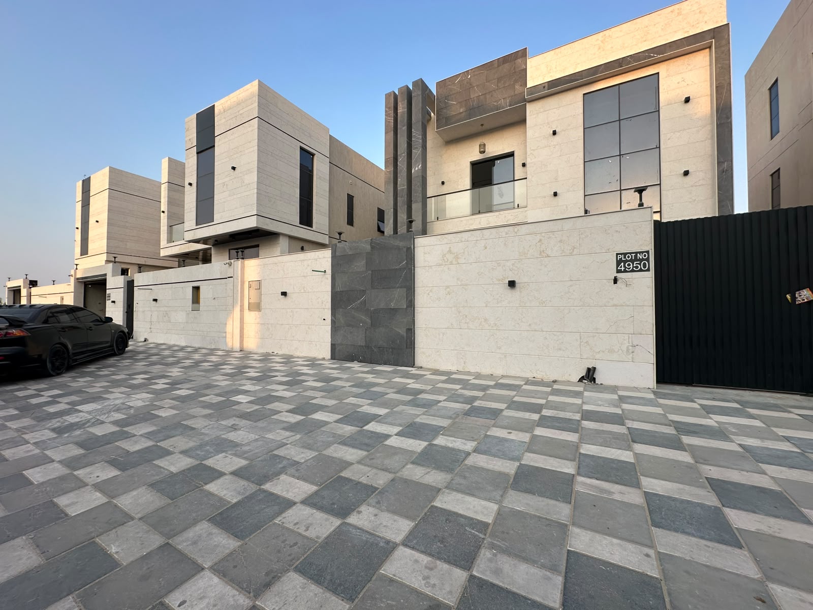 Modern villa for sale in Al Zahia with a private pool; registration fees included.