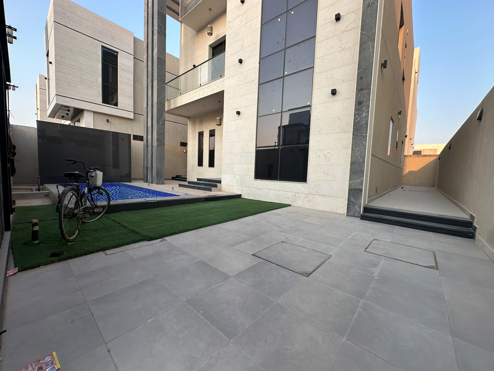 Modern villa for sale in Al Zahia with a private pool; registration fees included. 5