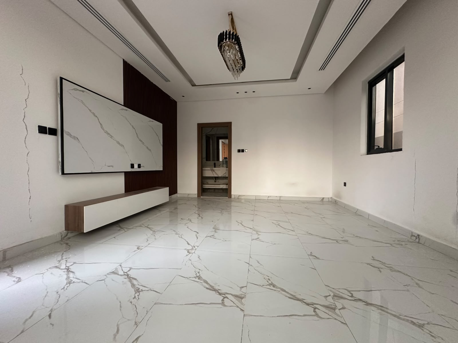 Modern villa for sale in Al Zahia with a private pool; registration fees included. 9
