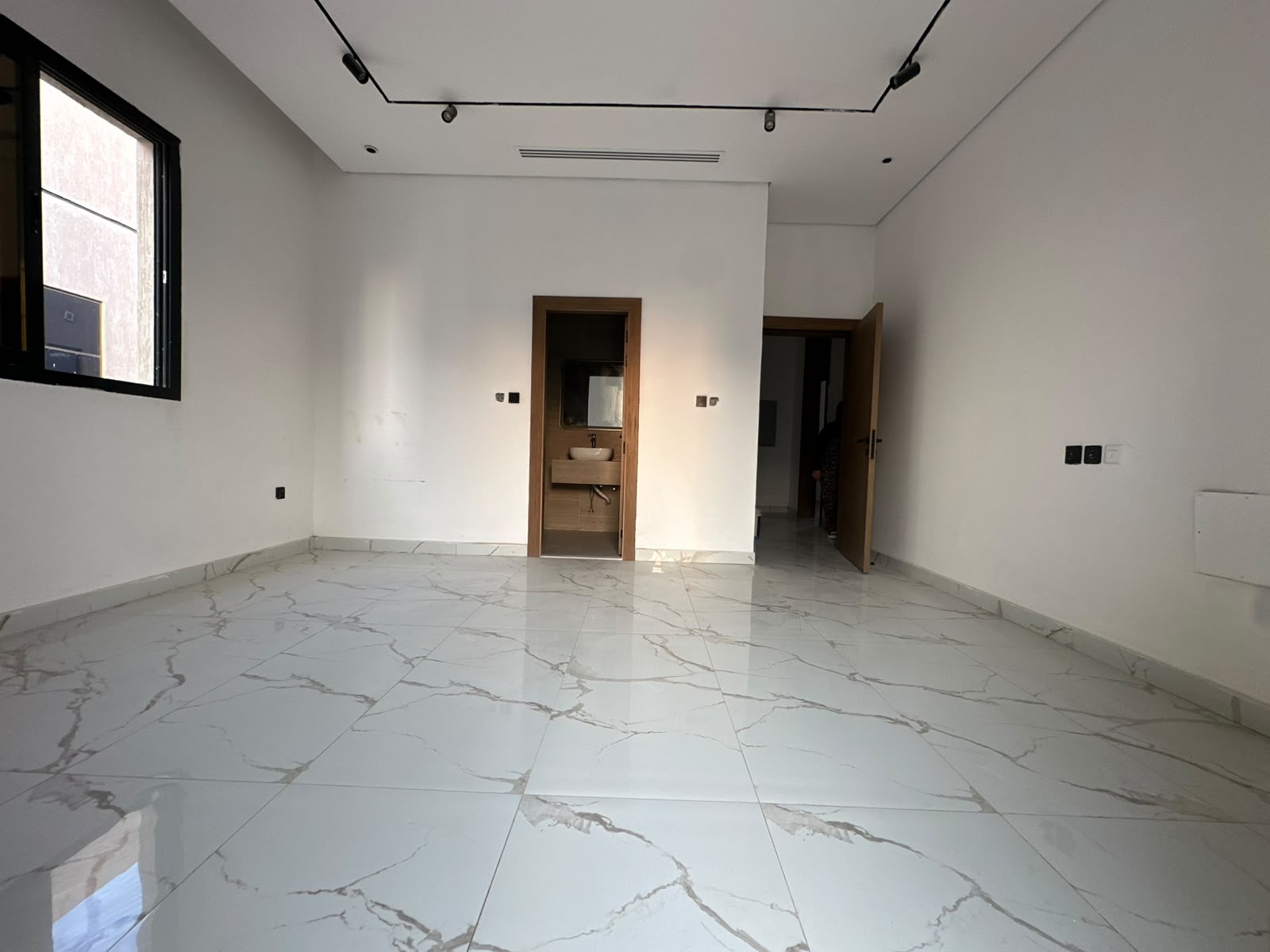 Modern villa for sale in Al Zahia with a private pool; registration fees included. 13