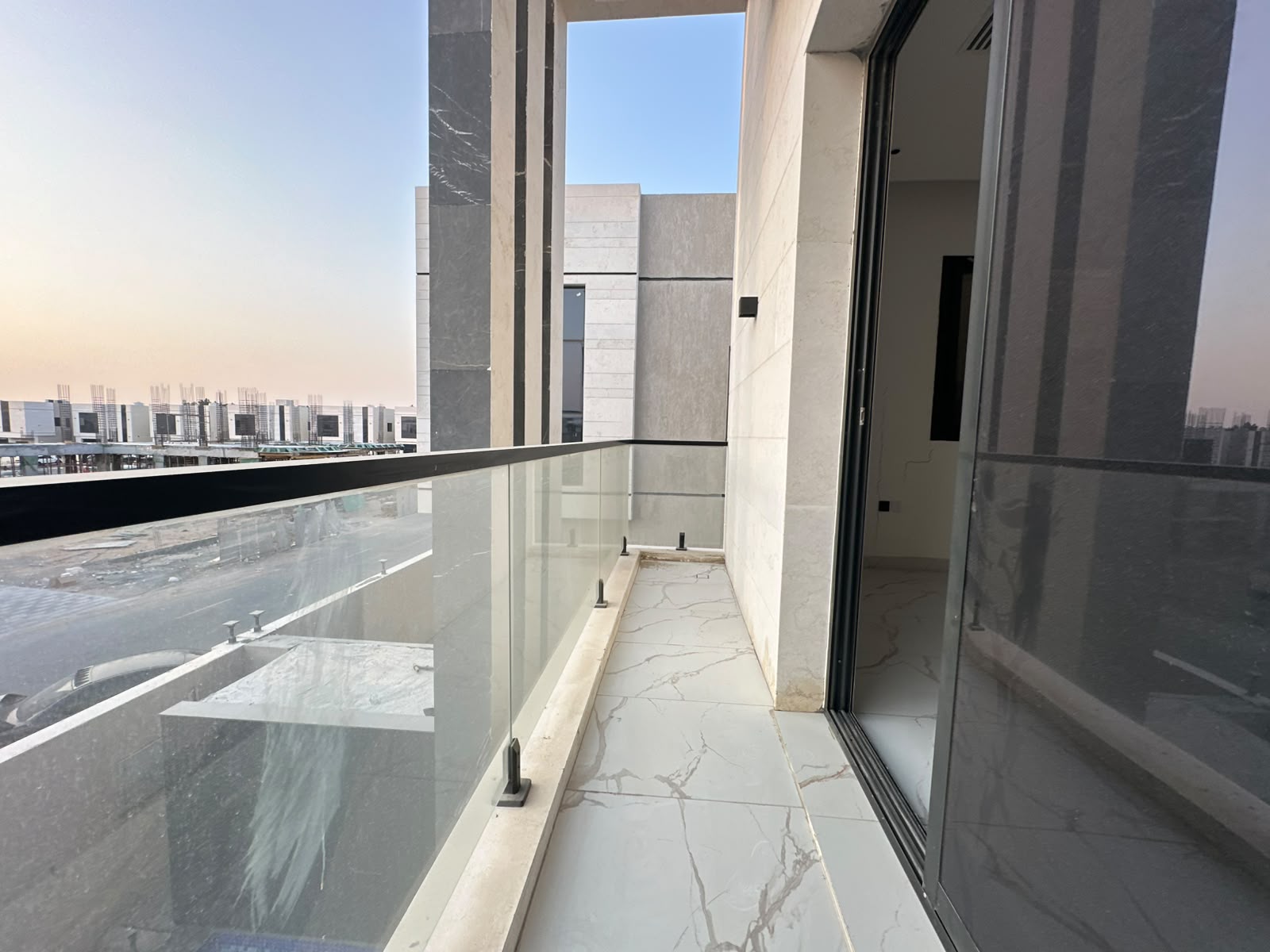 Modern villa for sale in Al Zahia with a private pool; registration fees included. 14