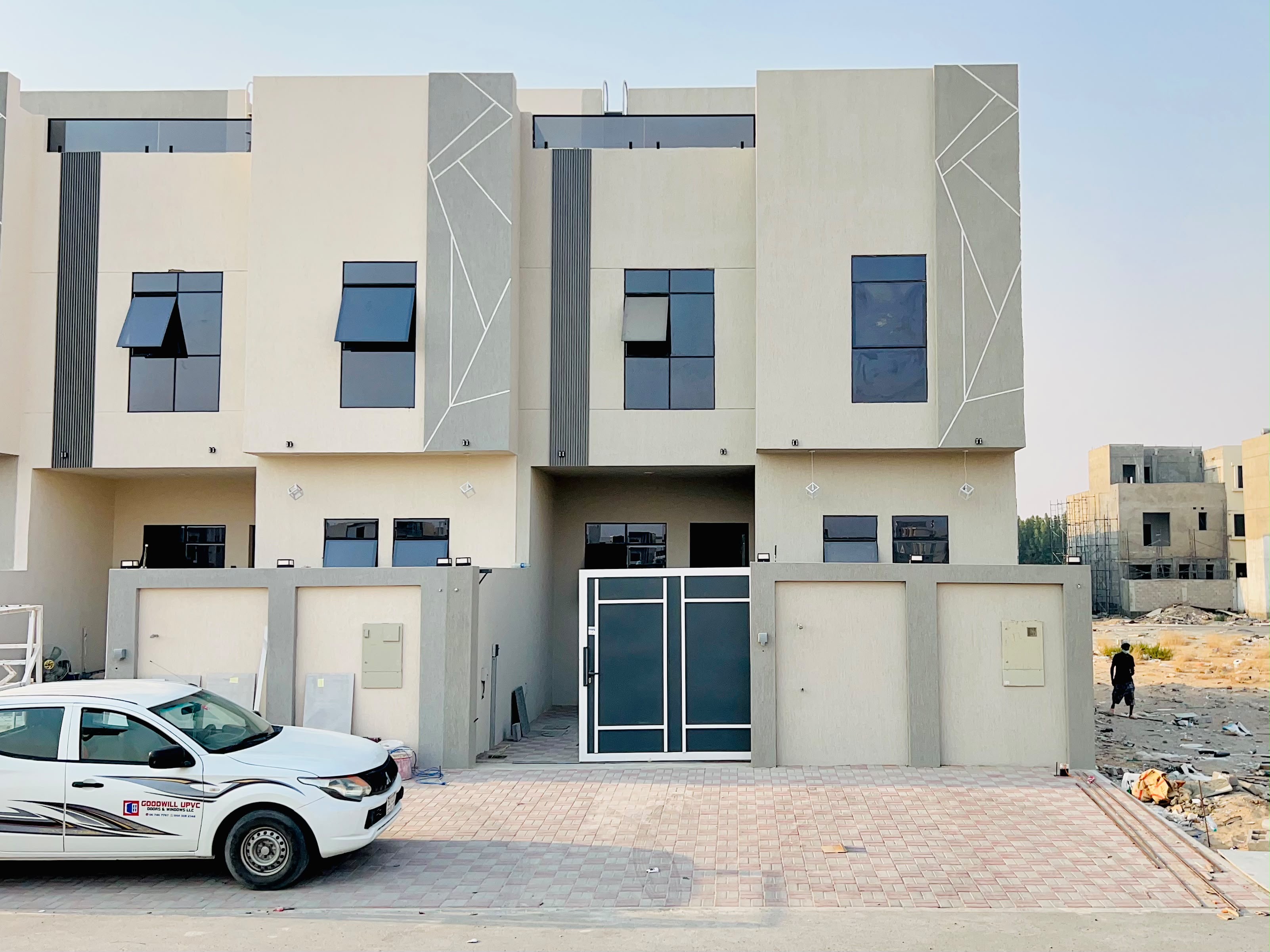 Townhouse for sale in Al Zahia area, Ajman, with a furnished roof terrace.