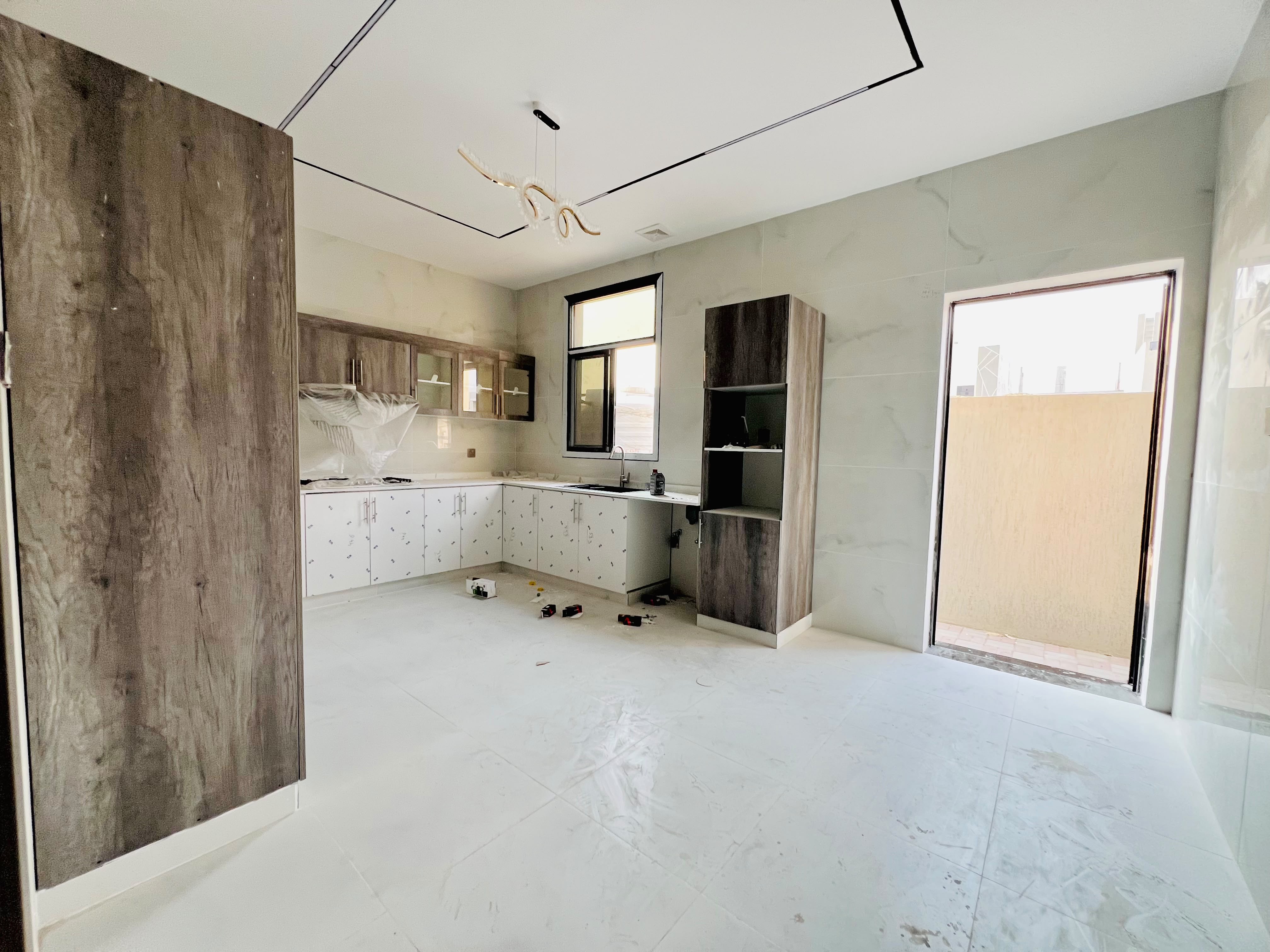 Townhouse for sale in Al Zahia area, Ajman, with a furnished roof terrace. 6