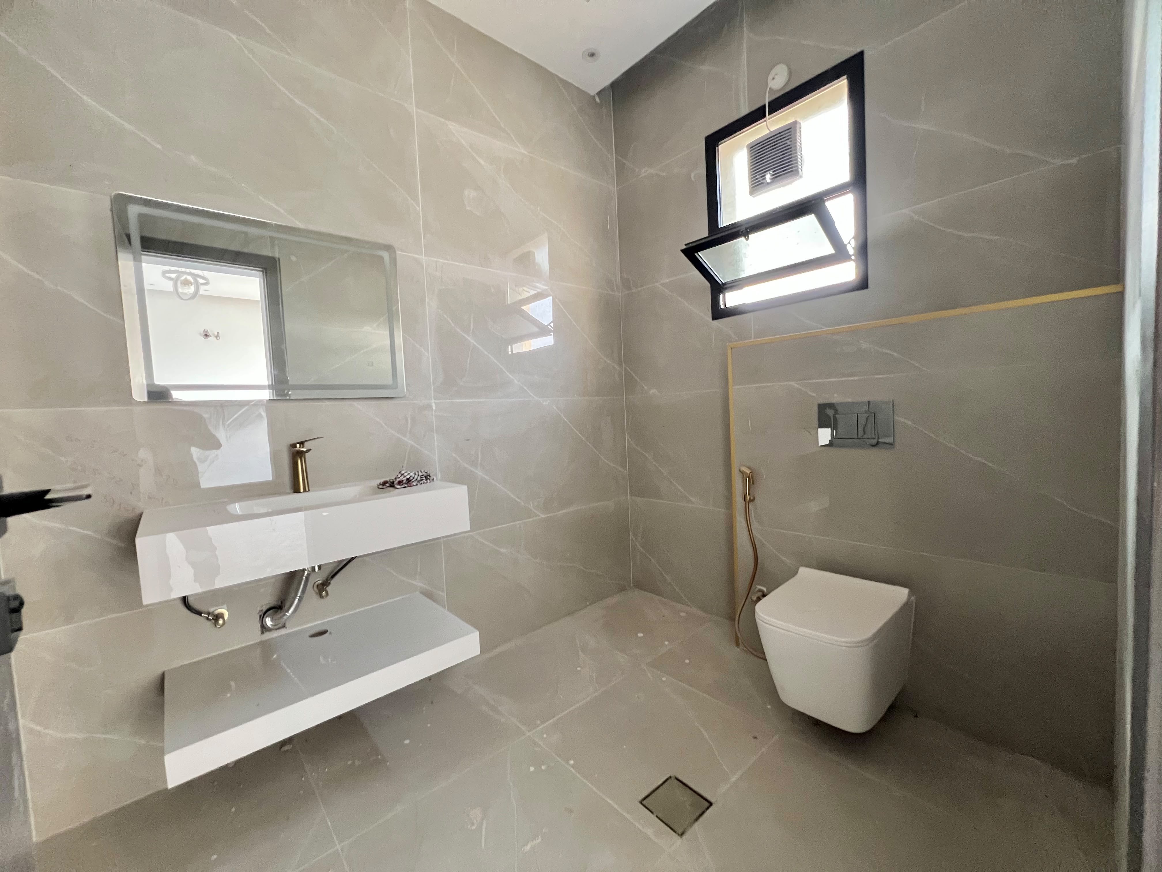 Townhouse for sale in Al Zahia area, Ajman, with a furnished roof terrace. 9