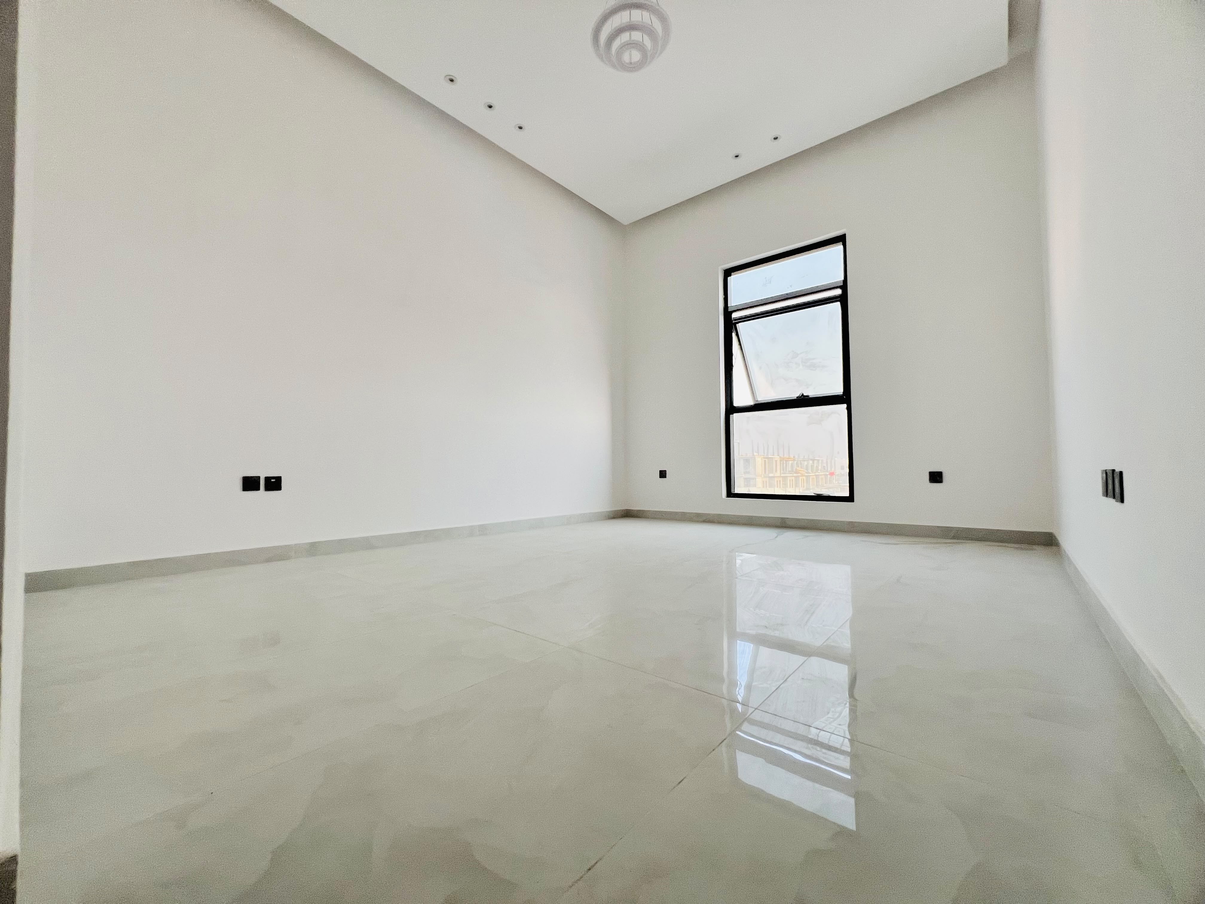 Townhouse for sale in Al Zahia area, Ajman, with a furnished roof terrace. 13