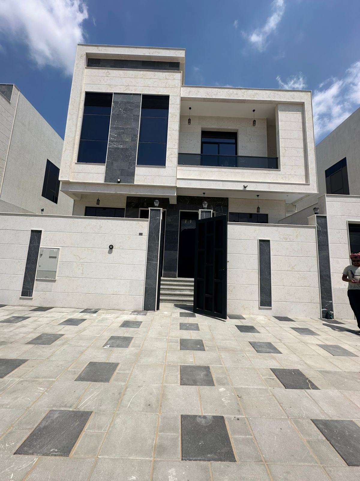 Modern villa for sale in Al Bahia area, Ajman, including air conditioning.