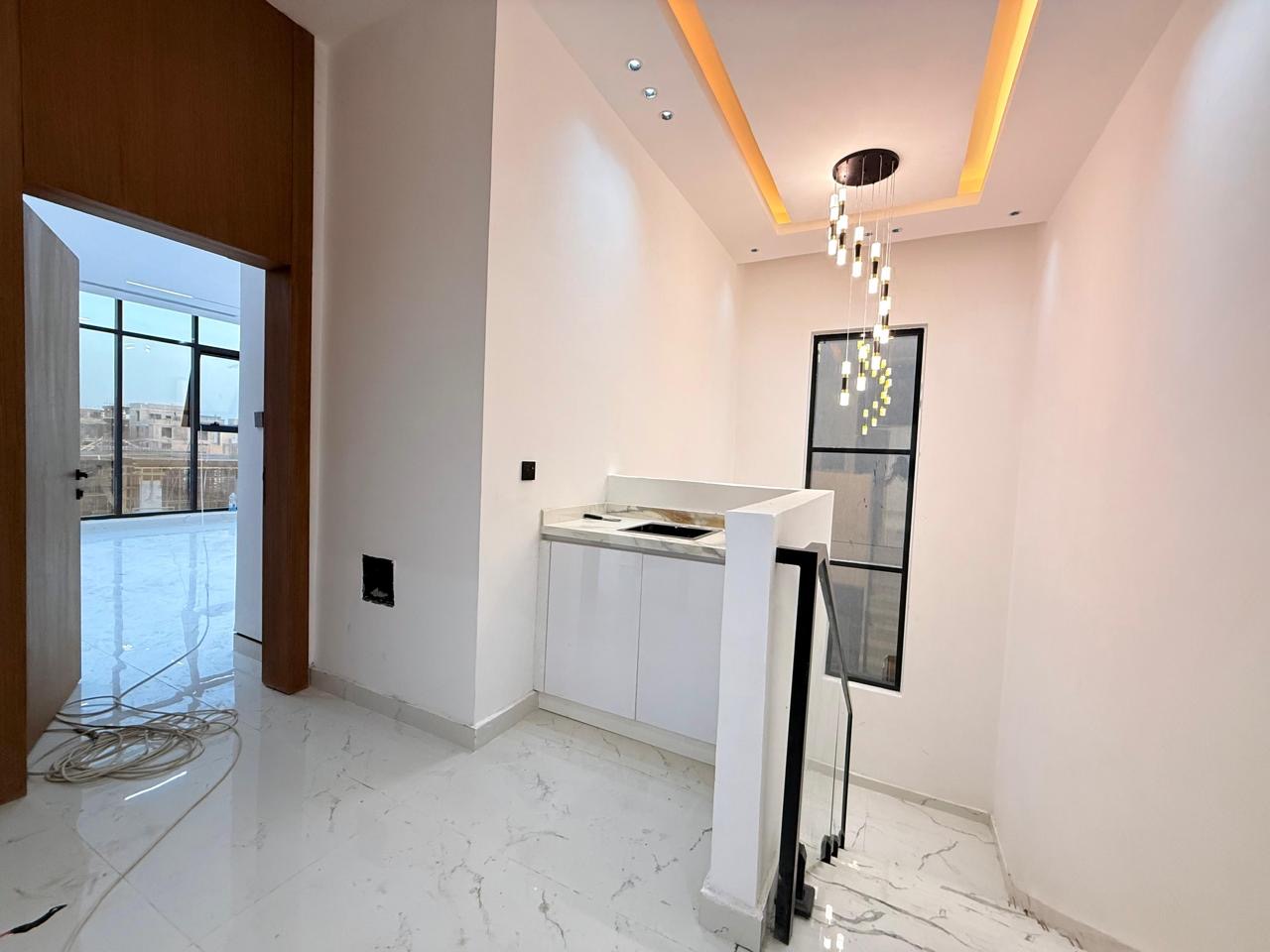 Villa for sale in Al Zahia area, Ajman. Registration fees included. 11
