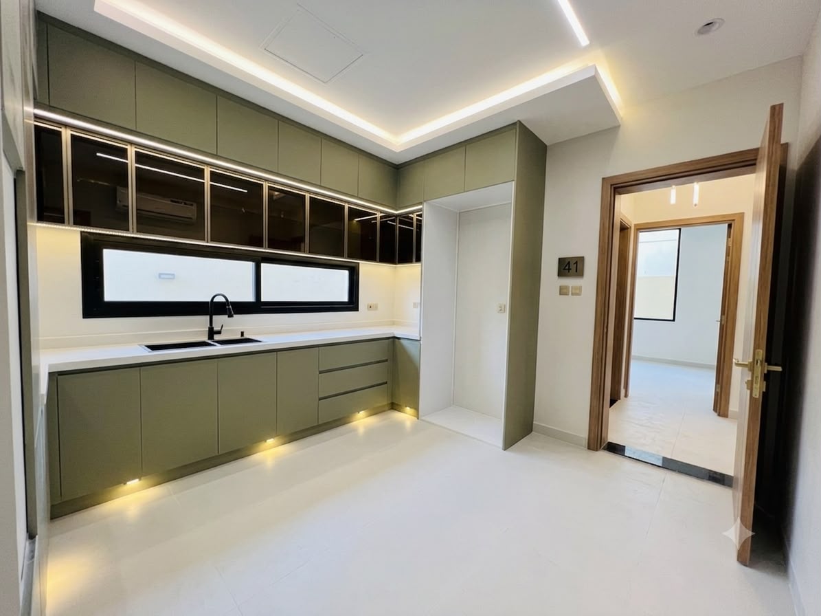 Villa for sale in Al Zahia, including registration and ownership fees, and with air conditioning. 13