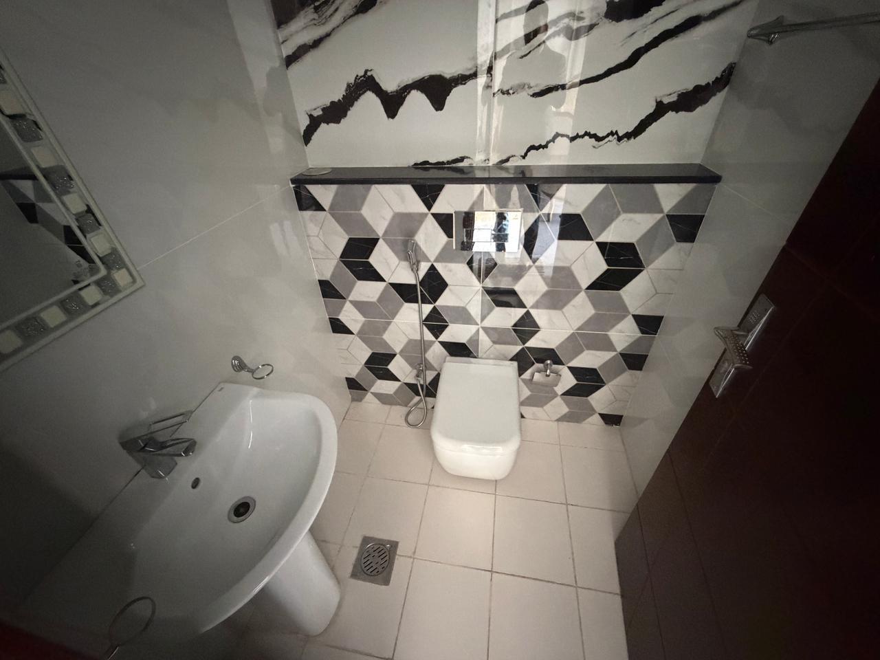 Furnished villa for sale in Al Yasmin area, including air conditioning, electricity, and water. 5