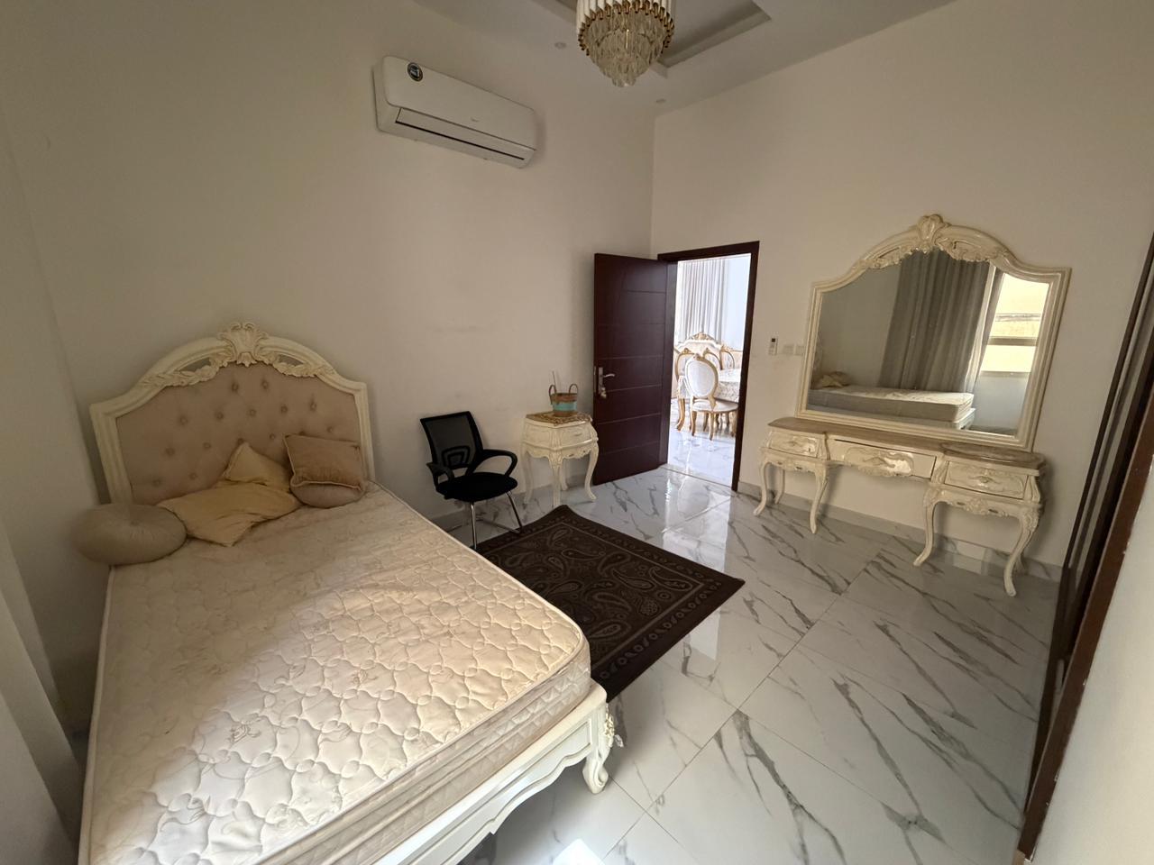Furnished villa for sale in Al Yasmin area, including air conditioning, electricity, and water. 6