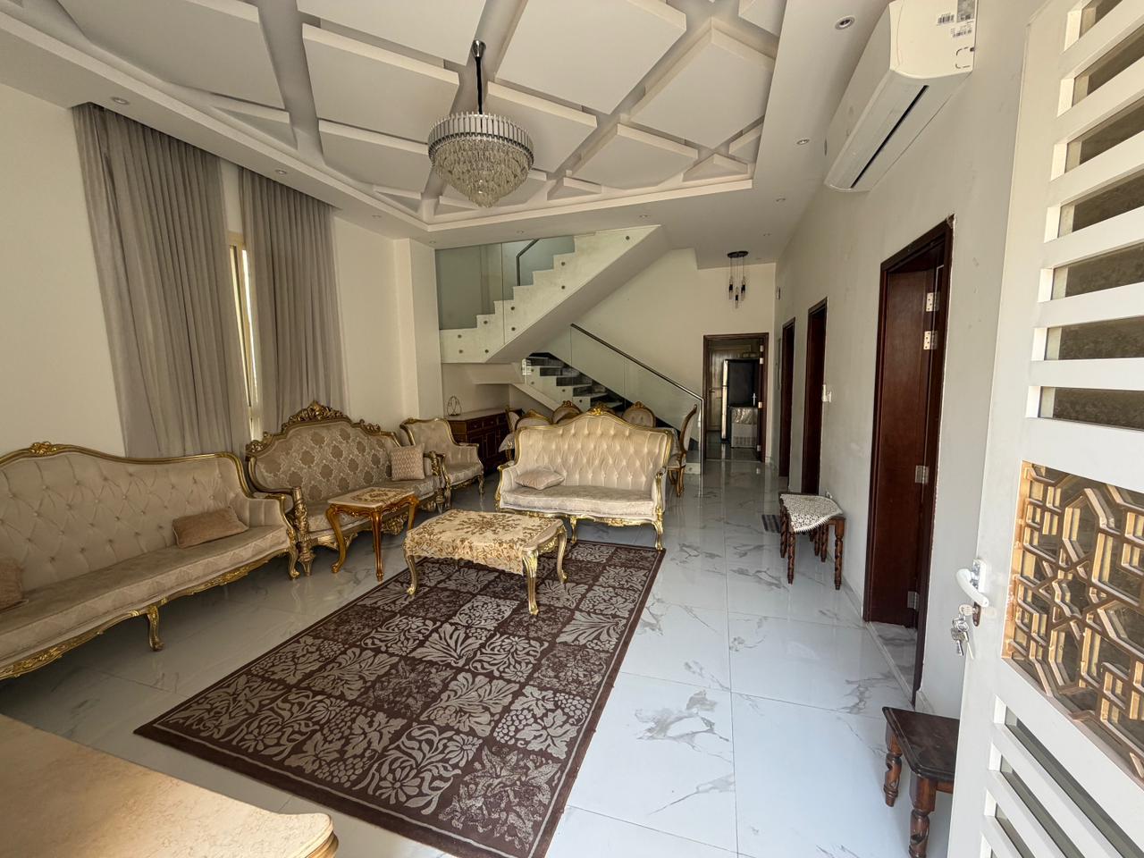 Furnished villa for sale in Al Yasmin area, including air conditioning, electricity, and water. 7