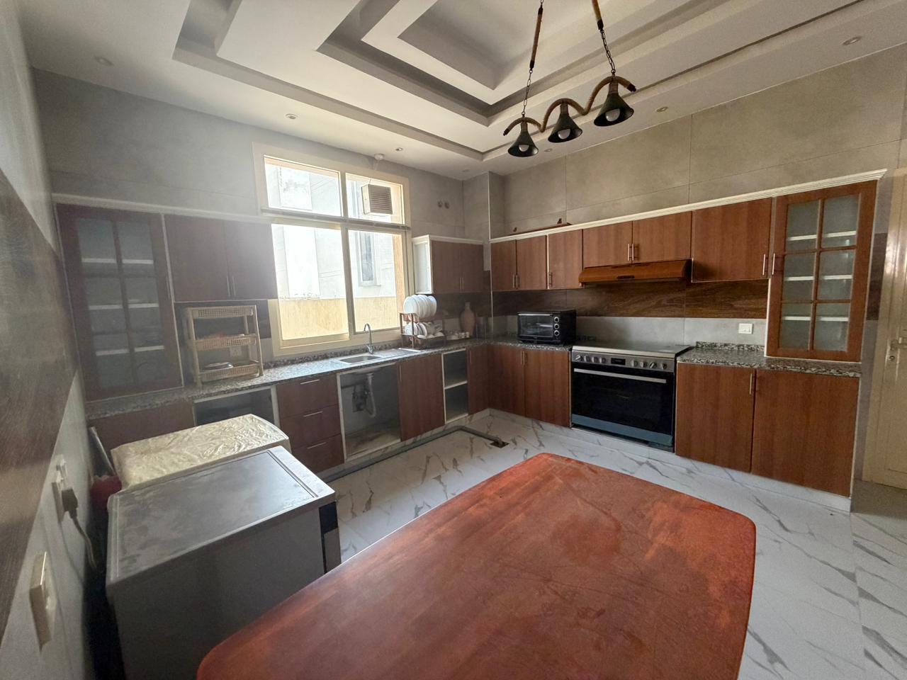 Furnished villa for sale in Al Yasmin area, including air conditioning, electricity, and water. 9