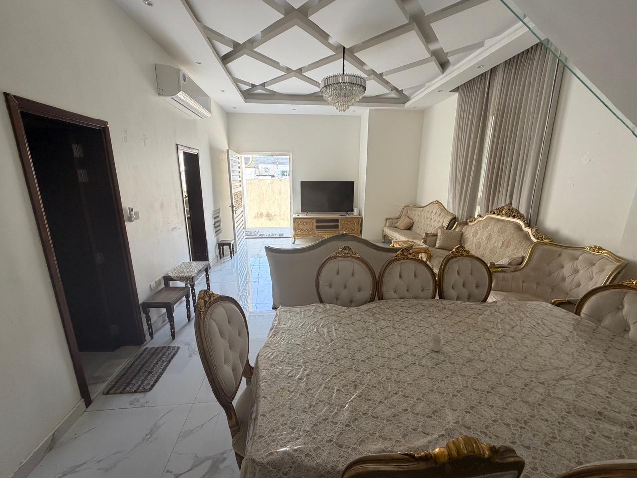 Furnished villa for sale in Al Yasmin area, including air conditioning, electricity, and water. 10