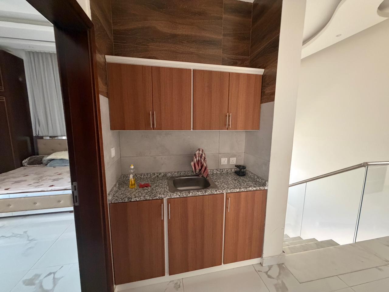 Furnished villa for sale in Al Yasmin area, including air conditioning, electricity, and water. 11
