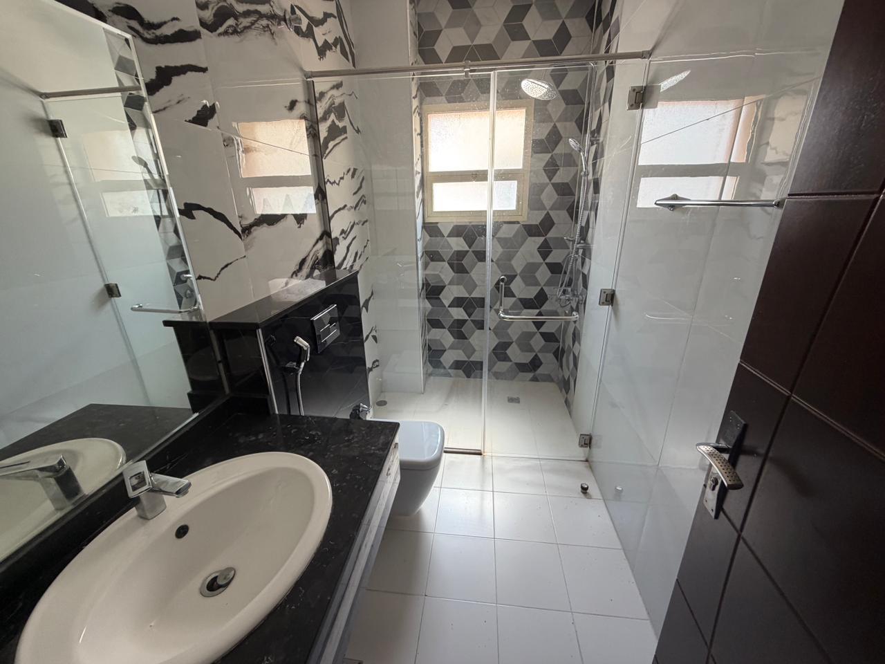 Furnished villa for sale in Al Yasmin area, including air conditioning, electricity, and water. 13