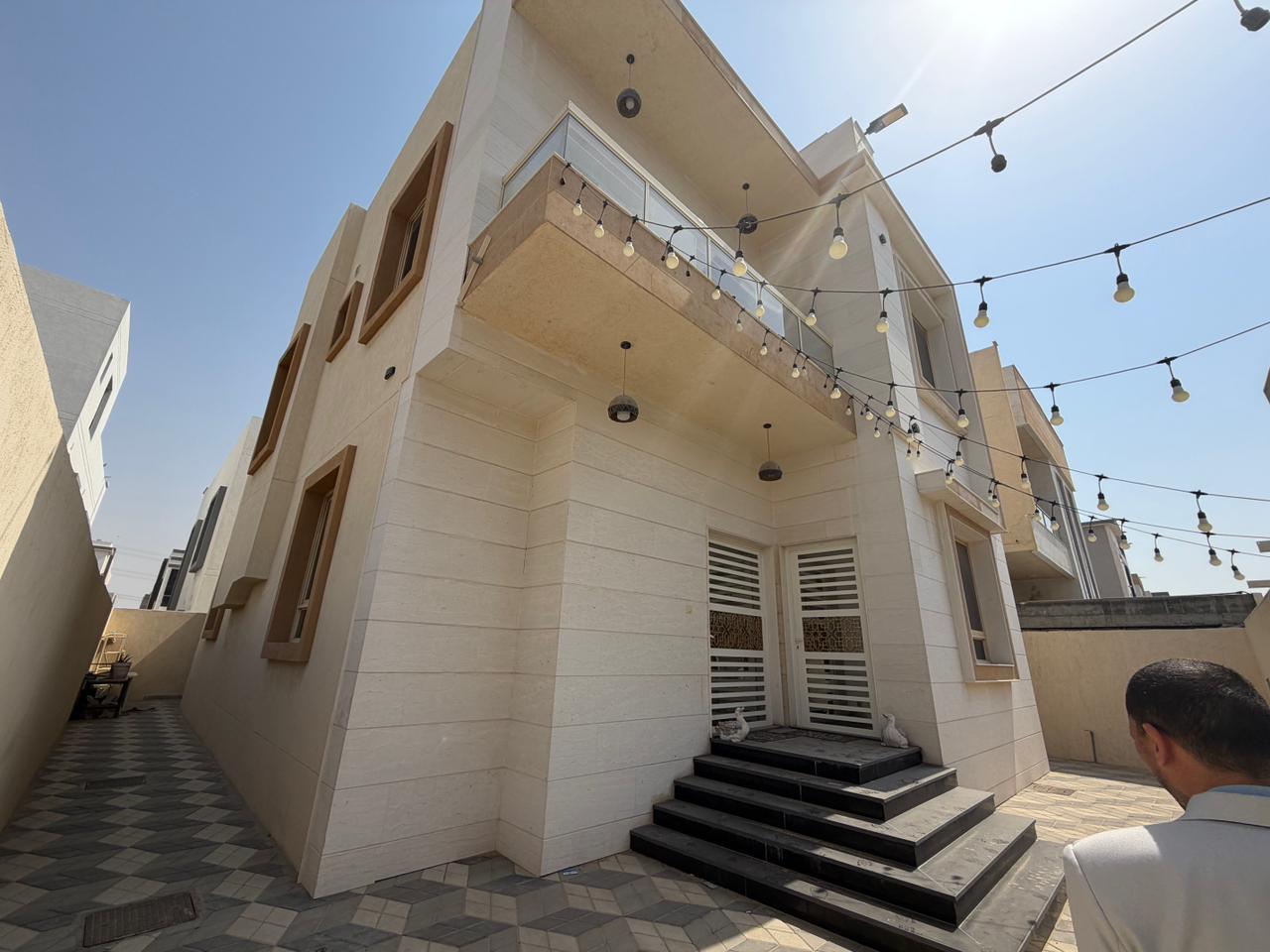 Furnished villa for sale in Al Yasmin area, including air conditioning, electricity, and water. 15