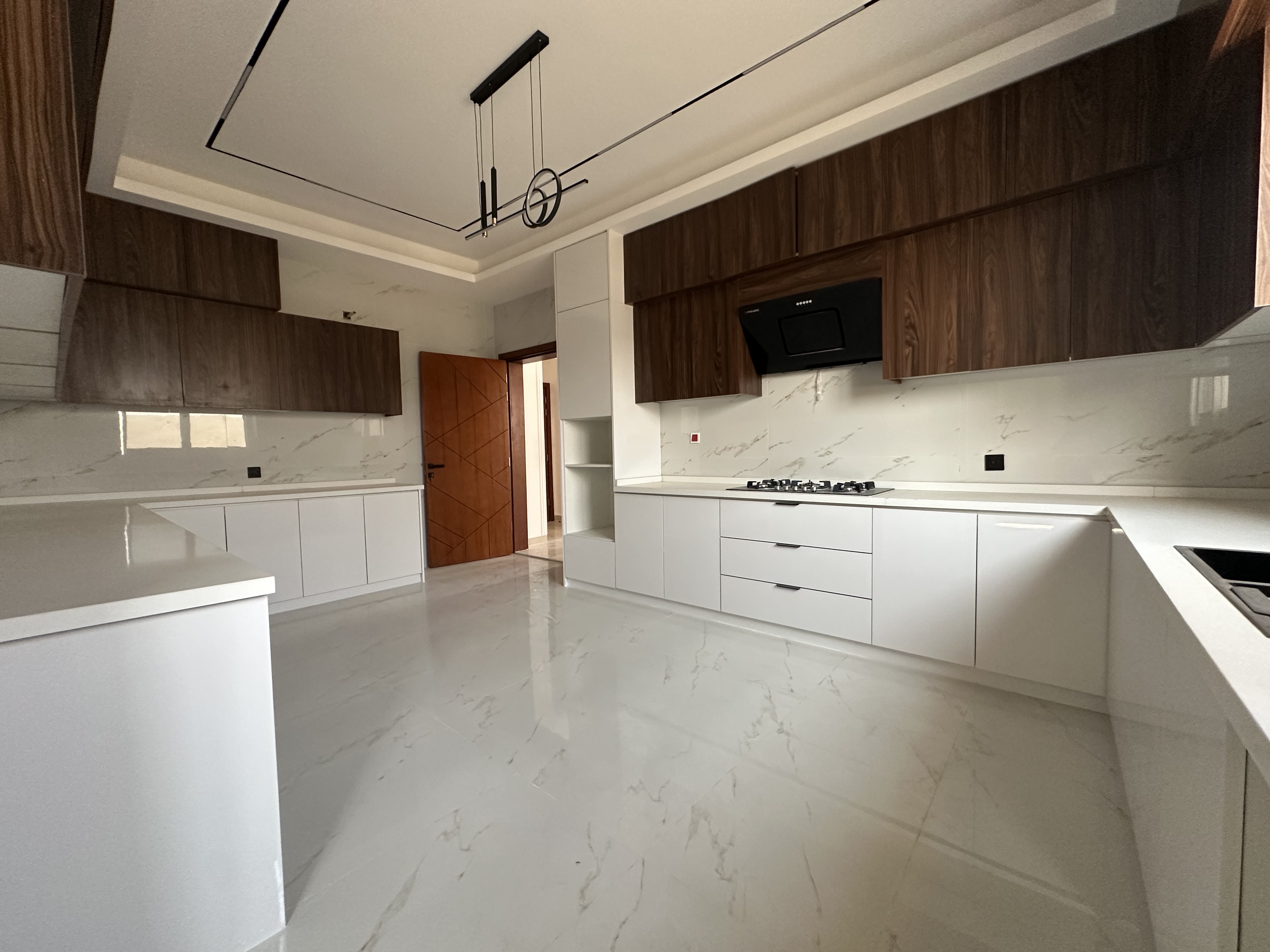 Villa for sale in Al-Raqayeb area, large area, private pool, open view 11