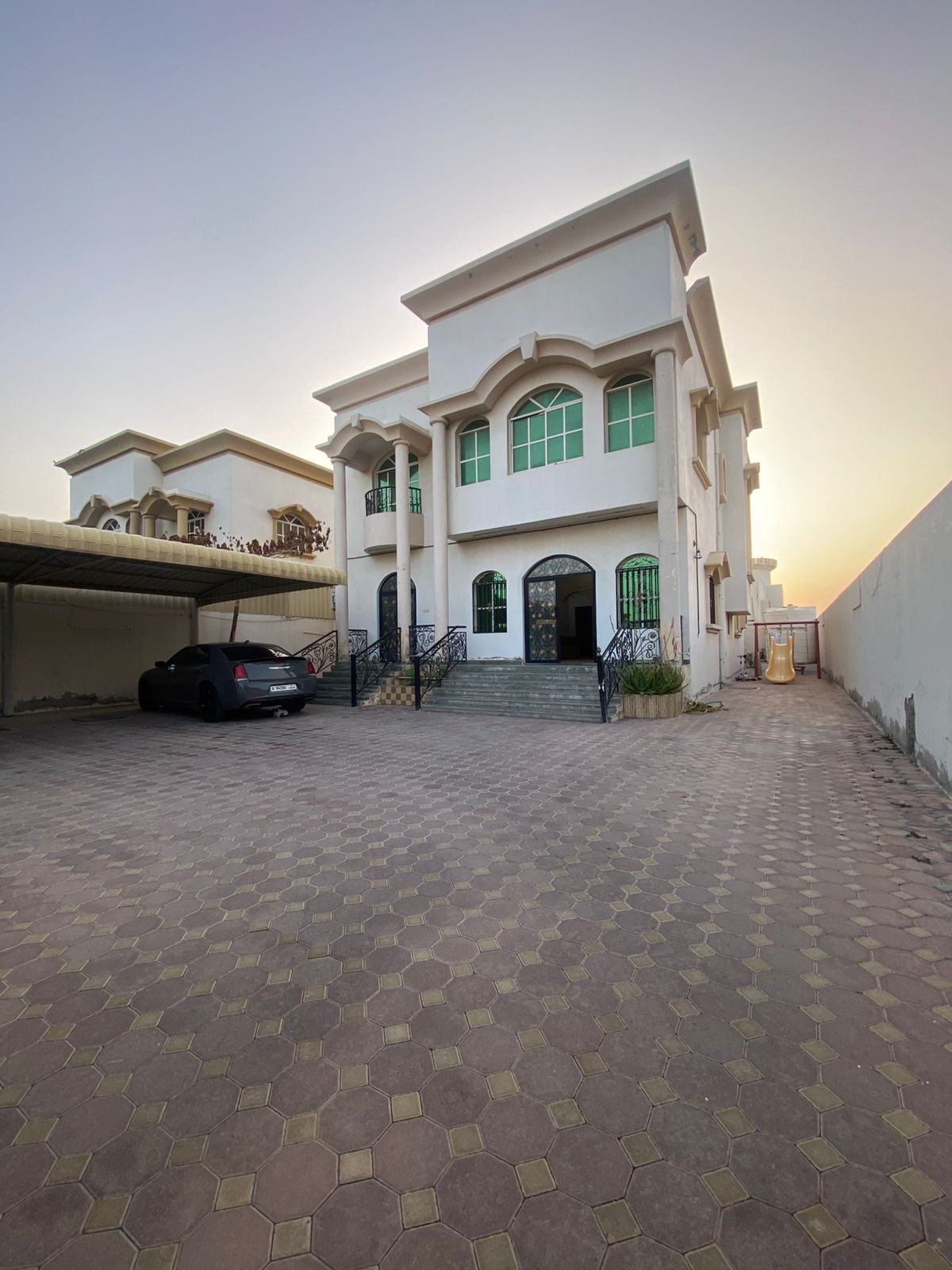Furnished villa for sale in Al Rawdah; price includes water, electricity, and air conditioning.
