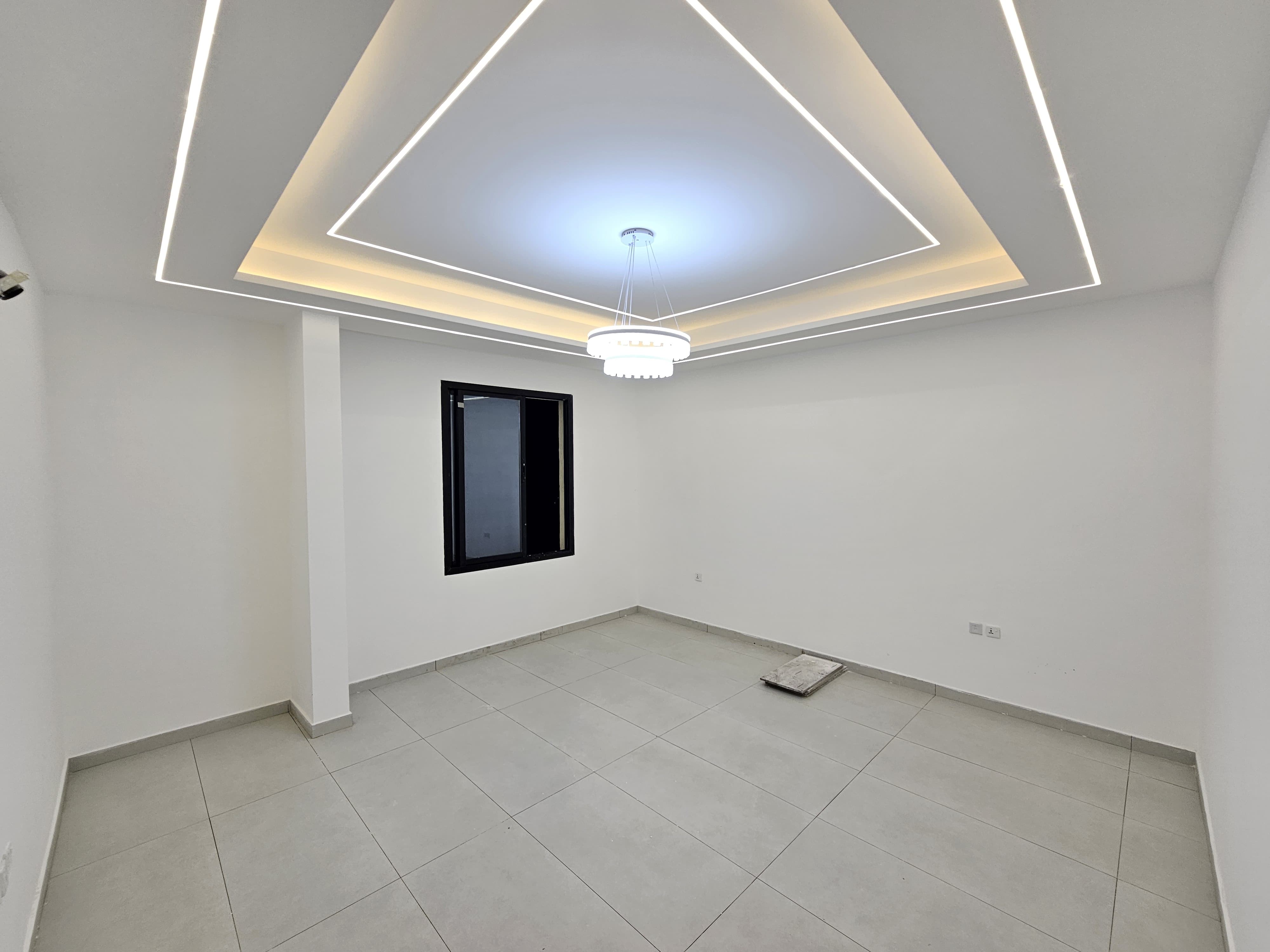 A residential villa is available on Al Zubair Street in Al Helio/2. It features luxurious modern finishes, natural stone and marble facades, distinctive lighting, and an interior design comprising a majlis, bathroom, washrooms, a large kitchen, a living room with a bathroom, four spacious master bedrooms with built-in wardrobes, and a balcony. The land area is 160 square meters (1722 square feet), and the built-up area is 3000 square feet (265 square meters). Registration and ownership fees are included. The asking price is AED 1,270,000. 3