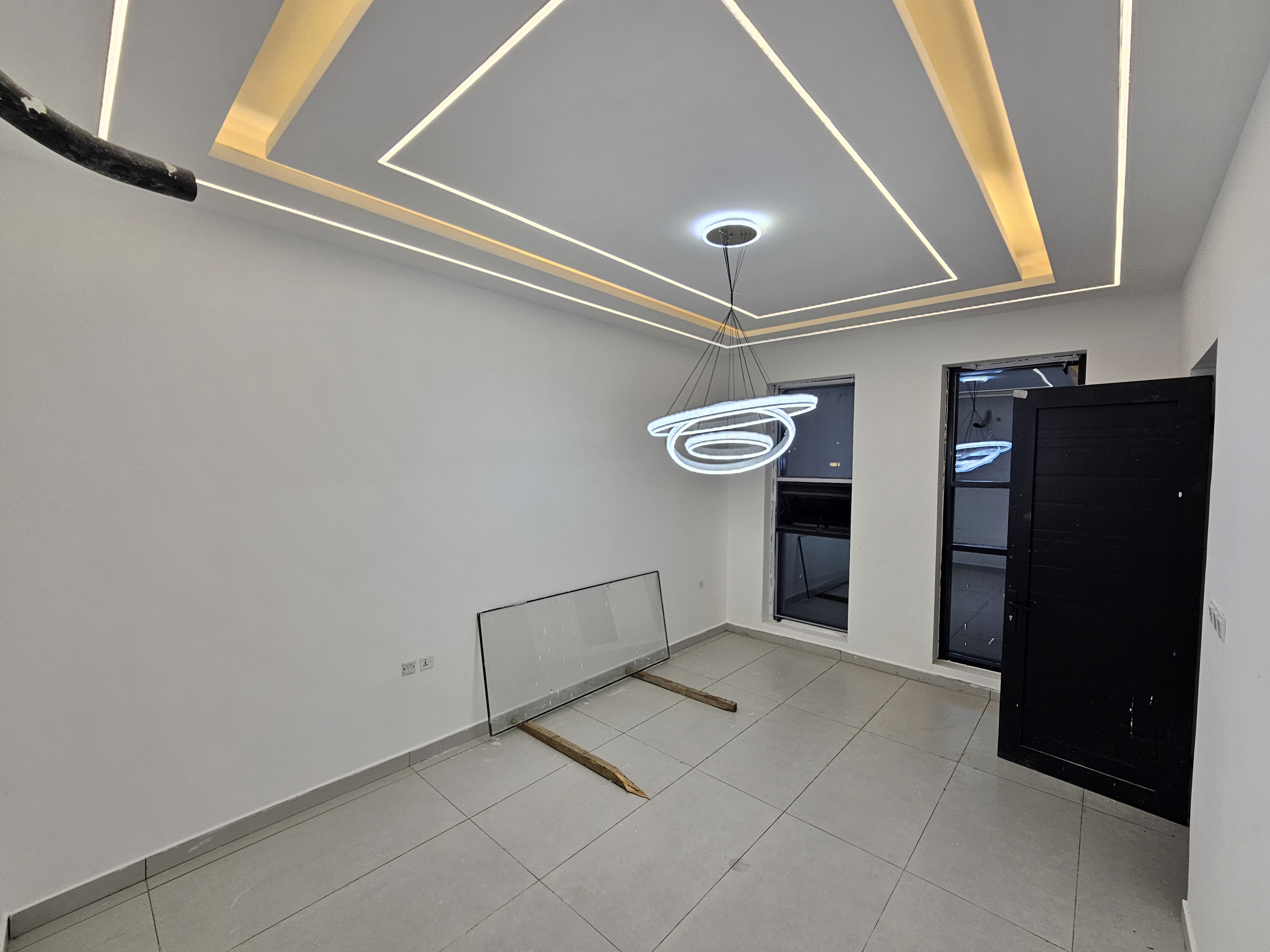 A residential villa is available on Al Zubair Street in Al Helio/2. It features luxurious modern finishes, natural stone and marble facades, distinctive lighting, and an interior design comprising a majlis, bathroom, washrooms, a large kitchen, a living room with a bathroom, four spacious master bedrooms with built-in wardrobes, and a balcony. The land area is 160 square meters (1722 square feet), and the built-up area is 3000 square feet (265 square meters). Registration and ownership fees are included. The asking price is AED 1,270,000. 4