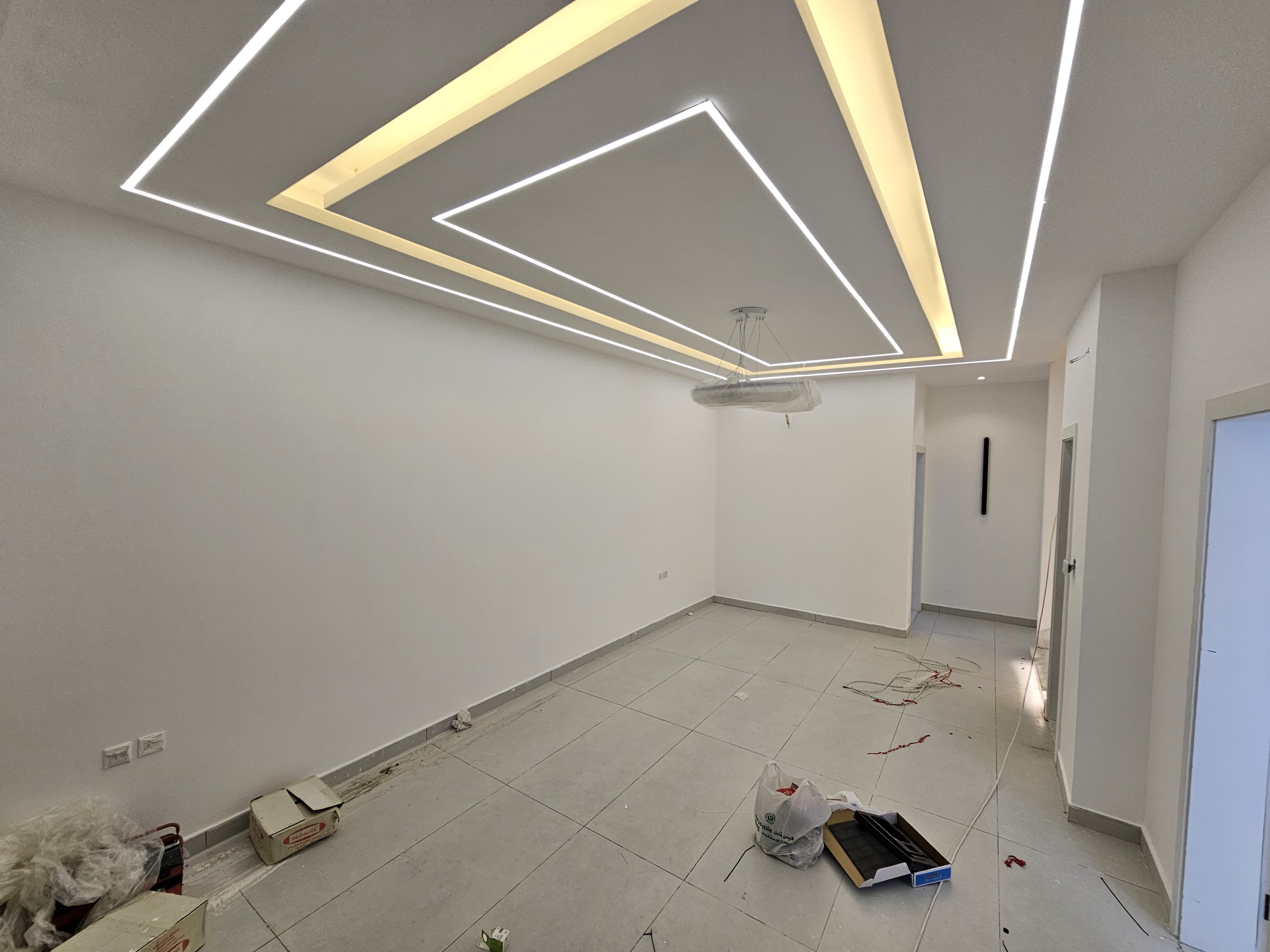 A residential villa is available on Al Zubair Street in Al Helio/2. It features luxurious modern finishes, natural stone and marble facades, distinctive lighting, and an interior design comprising a majlis, bathroom, washrooms, a large kitchen, a living room with a bathroom, four spacious master bedrooms with built-in wardrobes, and a balcony. The land area is 160 square meters (1722 square feet), and the built-up area is 3000 square feet (265 square meters). Registration and ownership fees are included. The asking price is AED 1,270,000. 7