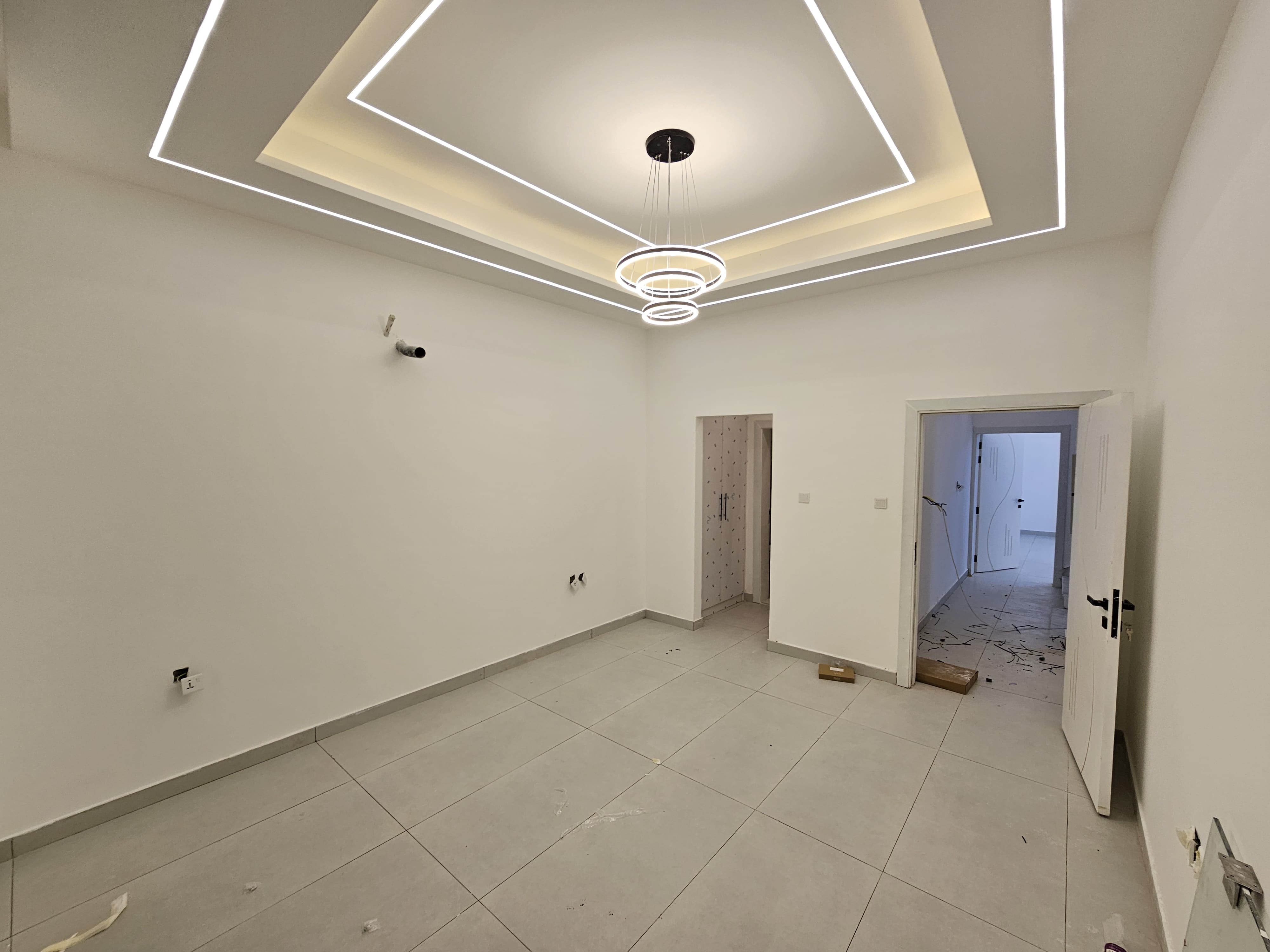 A residential villa is available on Al Zubair Street in Al Helio/2. It features luxurious modern finishes, natural stone and marble facades, distinctive lighting, and an interior design comprising a majlis, bathroom, washrooms, a large kitchen, a living room with a bathroom, four spacious master bedrooms with built-in wardrobes, and a balcony. The land area is 160 square meters (1722 square feet), and the built-up area is 3000 square feet (265 square meters). Registration and ownership fees are included. The asking price is AED 1,270,000. 13