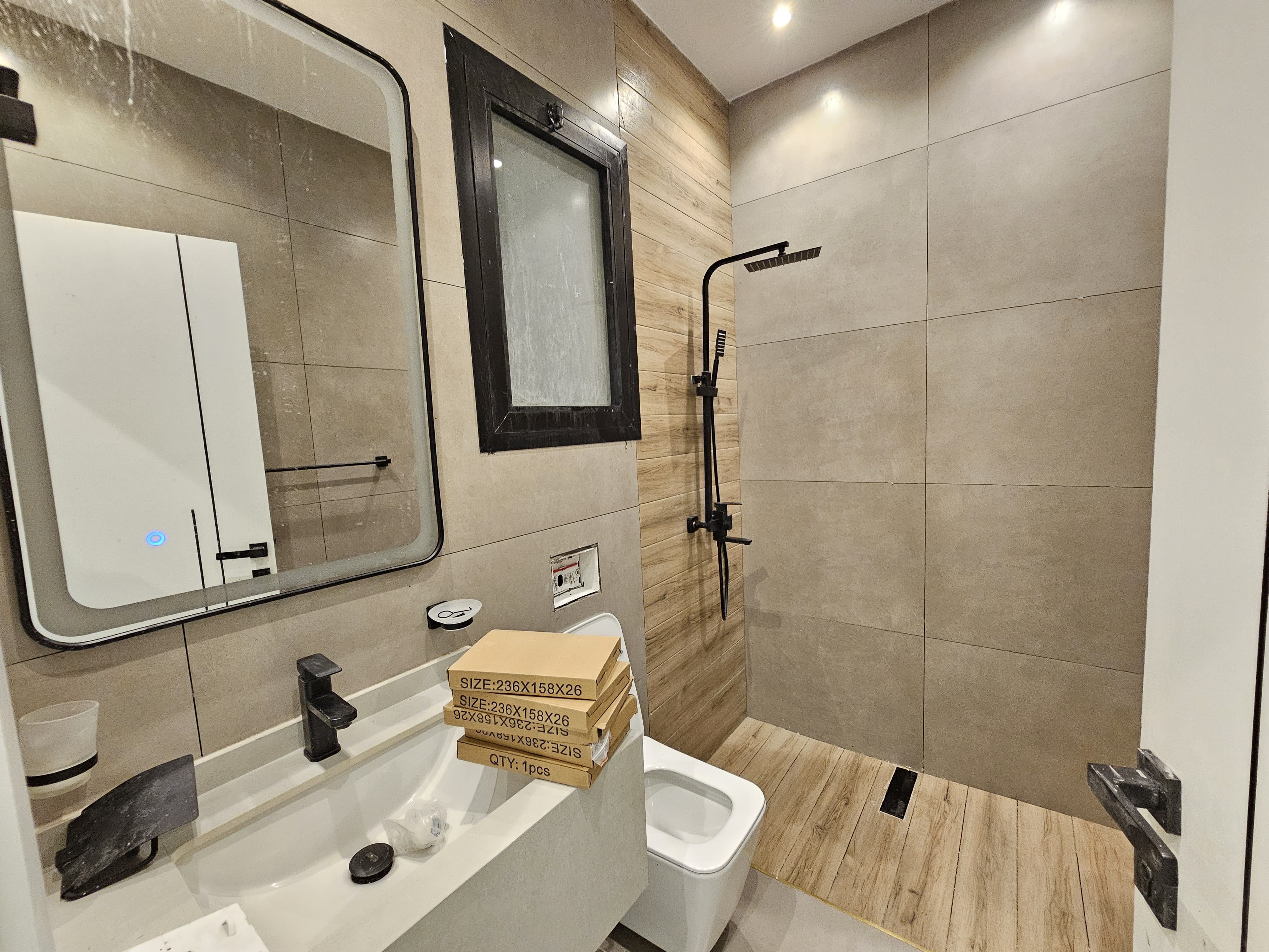 A residential villa is available on Al Zubair Street in Al Helio/2. It features luxurious modern finishes, natural stone and marble facades, distinctive lighting, and an interior design comprising a majlis, bathroom, washrooms, a large kitchen, a living room with a bathroom, four spacious master bedrooms with built-in wardrobes, and a balcony. The land area is 160 square meters (1722 square feet), and the built-up area is 3000 square feet (265 square meters). Registration and ownership fees are included. The asking price is AED 1,270,000. 15