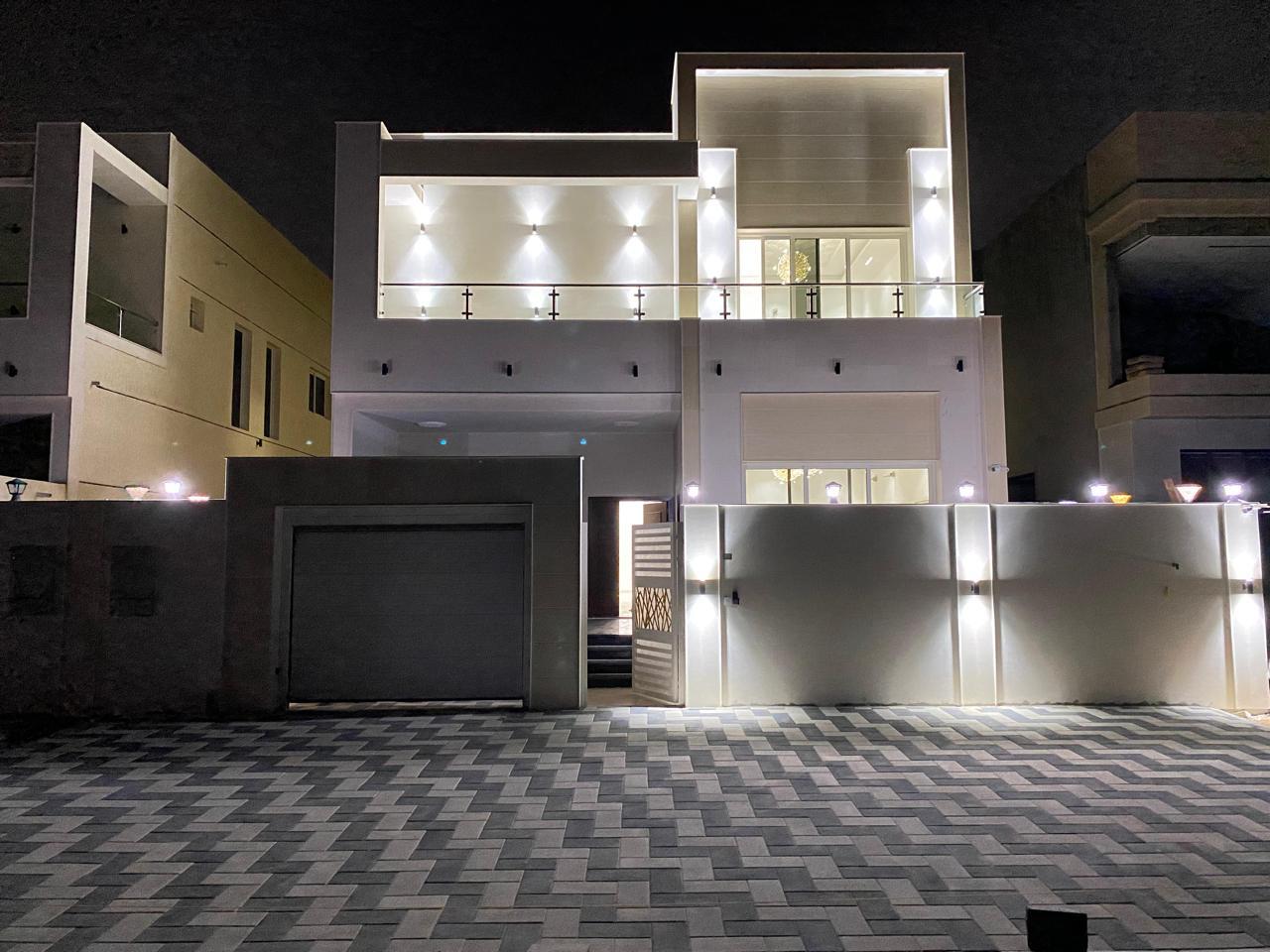 One of the most beautiful and largest villas in Al-Haliou, a new villa with a modern design and stone facade, located in [location missing].