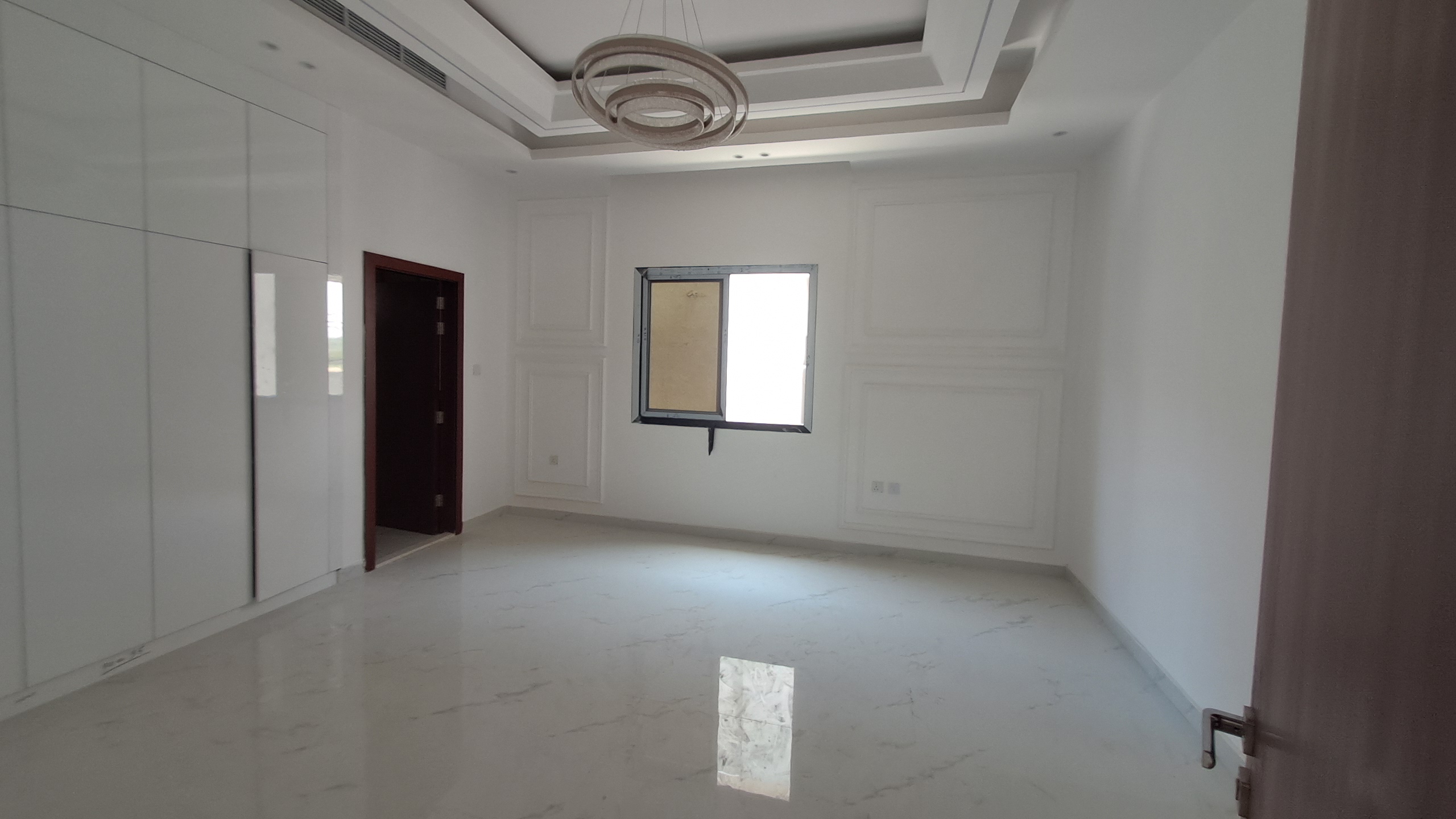 Villa for sale in Al Hilo 1, Ajman, UAE. Freehold ownership for all nationalities. Plot number 6329. Land area 3300 sq ft. Built-up area 4300 sq ft. 7 bedrooms, 8 bathrooms, majlis, 2 living rooms, central air conditioning, connected to water and electricity. Registration fees apply. 12