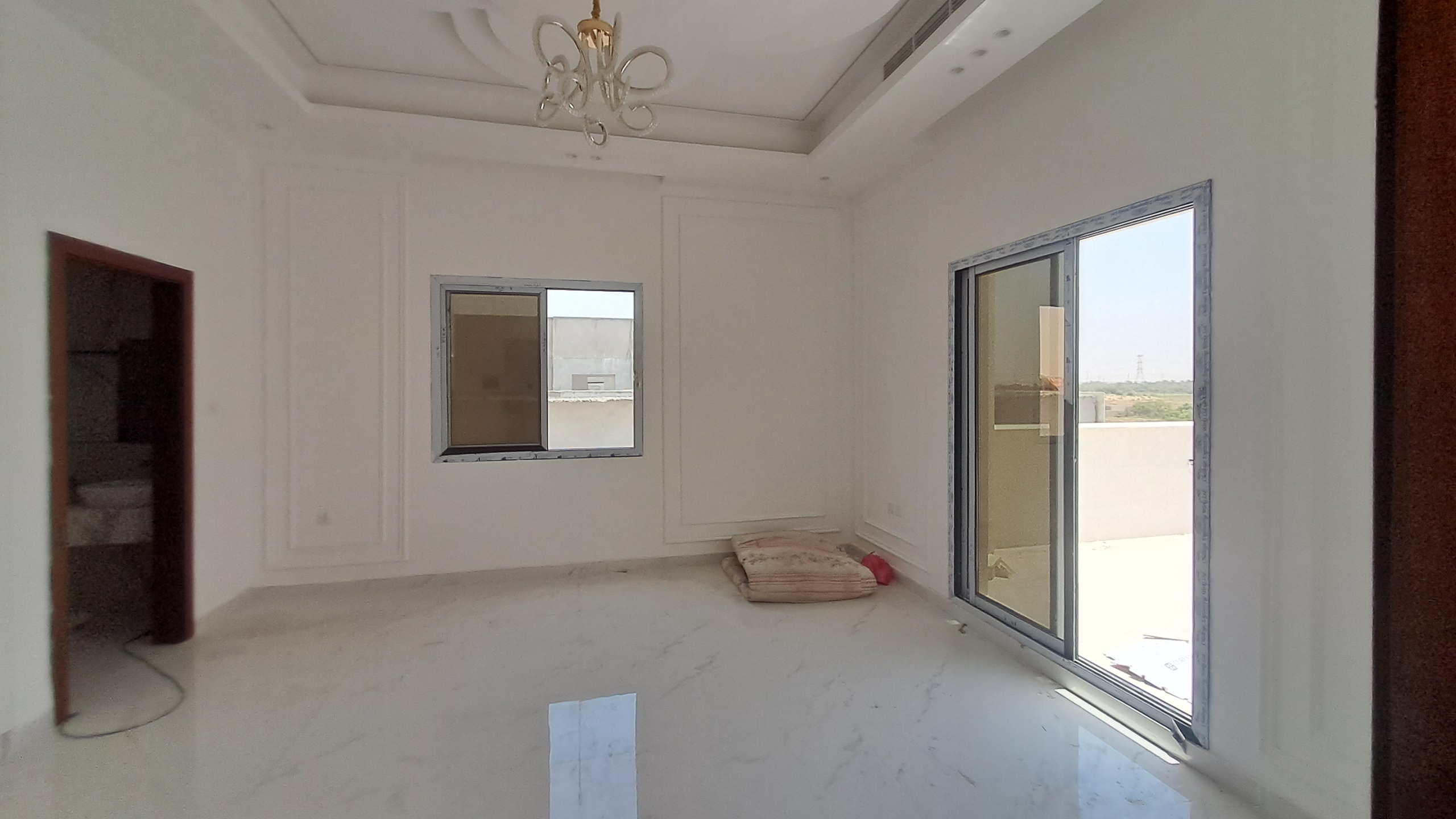 Villa for sale in Al Hilo 1, Ajman, UAE. Freehold ownership for all nationalities. Plot number 6329. Land area 3300 sq ft. Built-up area 4300 sq ft. 7 bedrooms, 8 bathrooms, majlis, 2 living rooms, central air conditioning, connected to water and electricity. Registration fees apply. 14