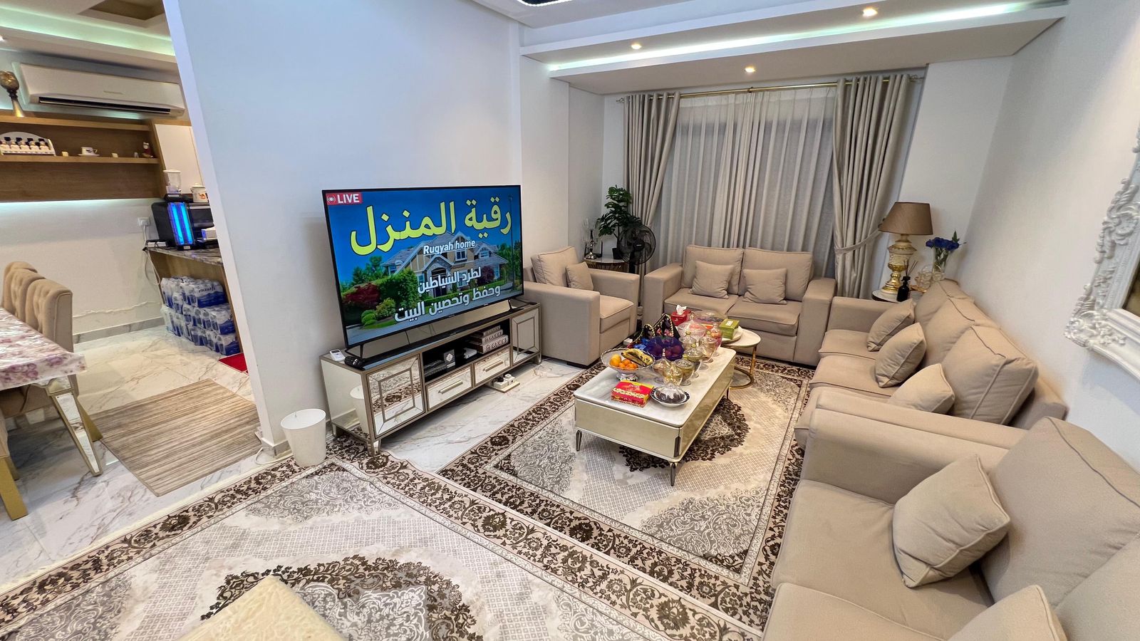 The price is 1.5 million. The villa is second occupancy and can be taken furnished or unfurnished. The villa is three years old and has five bedrooms, seven bathrooms, two living rooms, a rooftop terrace, a swimming pool, two kitchens, and three floors. 3