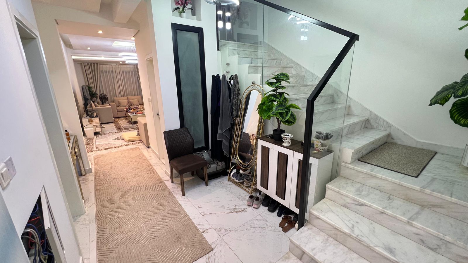 The price is 1.5 million. The villa is second occupancy and can be taken furnished or unfurnished. The villa is three years old and has five bedrooms, seven bathrooms, two living rooms, a rooftop terrace, a swimming pool, two kitchens, and three floors. 6