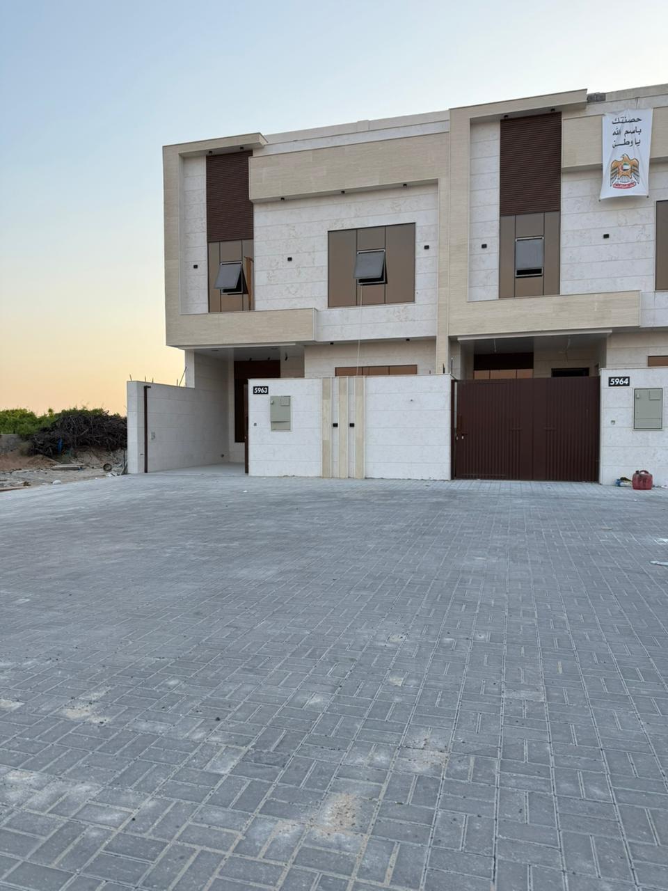 - *For Sale: 9 Townhouses* *in Al Helio Center 2, Ajman* on the main road leading to Al Zahia Roundabout. 25-meter setback from the street. 5 bedrooms and a roof terrace. Modern decor on ceilings and walls. Area: 2800 sq ft. *Includes registration fees, electricity, and air conditioning.* *Asking price: AED 1,470,000* *Negotiable*