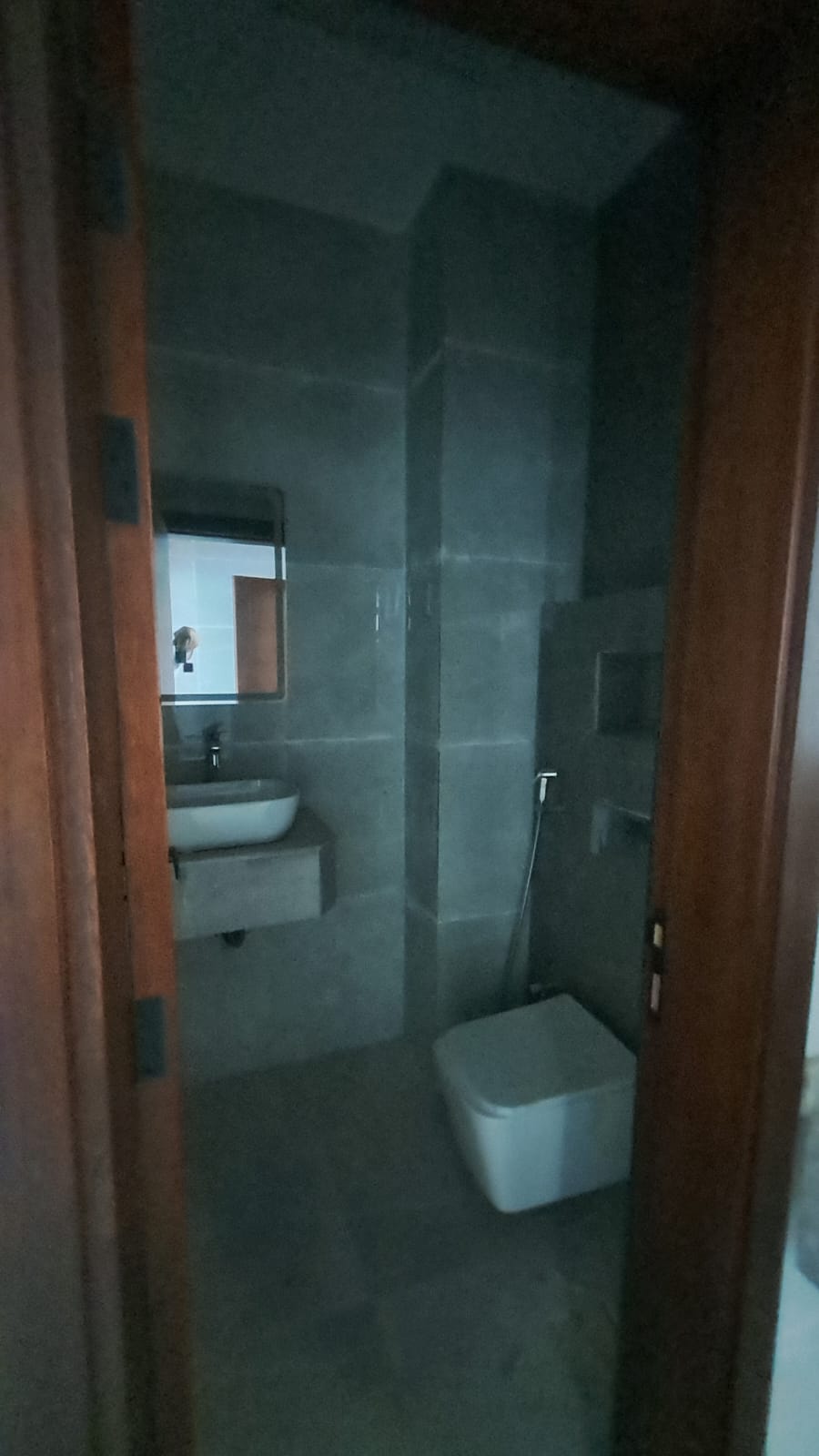 Townhouse in Al-Haylo area, 3 bedrooms and a maid's room, with indoor parking and an outdoor extension. 12