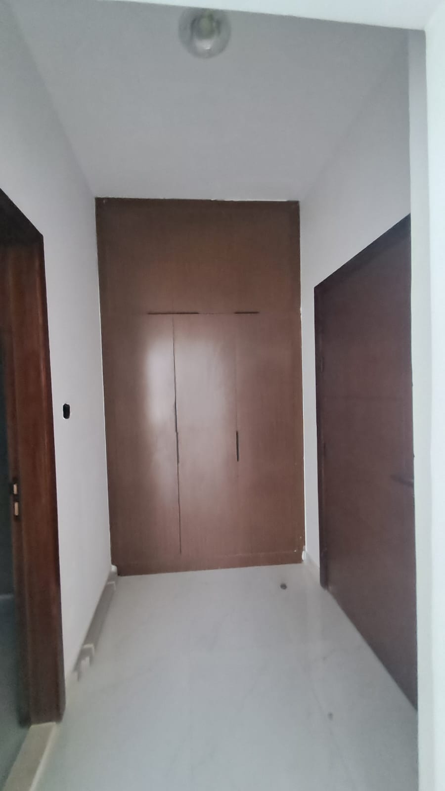 Townhouse in Al-Haylo area, 3 bedrooms and a maid's room, with indoor parking and an outdoor extension. 13