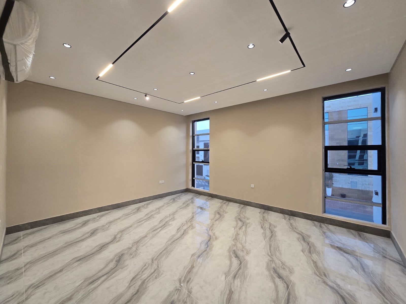 Luxury villa for sale in Al Bahia – Ajman | Excellent investment. A rare opportunity to own a spacious villa with a practical design and a quiet location suitable for families and investment. ✨ 📍 Al Bahia – Ajman. Land area: 280 sq m. Built-up area: approximately 4300 sq ft. 🛏️ Details: • 6 spacious bedrooms • Maid's room • 9 bathrooms • Large majlis (formal sitting room) • Guest lounge • Large main kitchen • Two preparation kitchens on the second floor and roof • Two parking spaces inside the house ✨ Features: • Spacious and comfortable design • Suitable for family living or investment • Quiet location close to services • Ready to move in immediately. Includes kitchen appliances, air conditioning for the entire villa, and registration fees. 💰 Price: (AED 1,950,000) 11