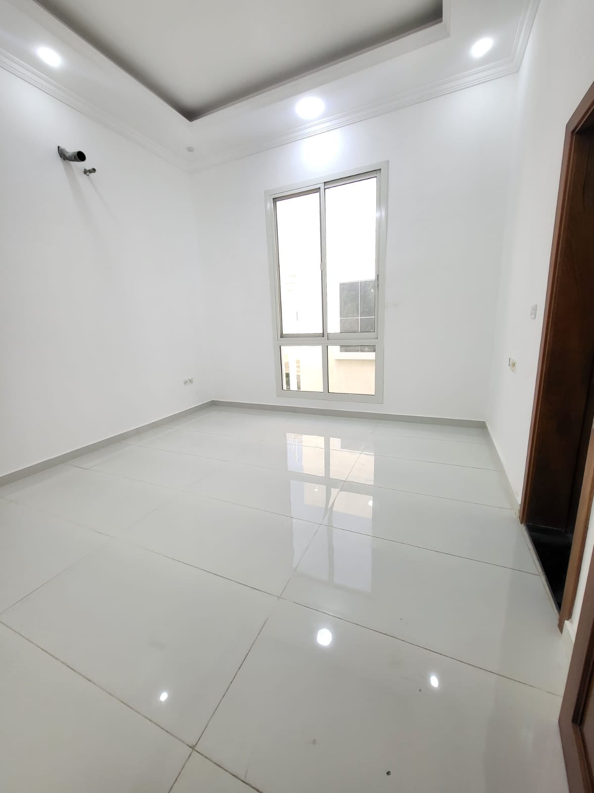 Villa for sale in Al Yasmin neighborhood, Ajman, with a modern design and distinctive features. 9