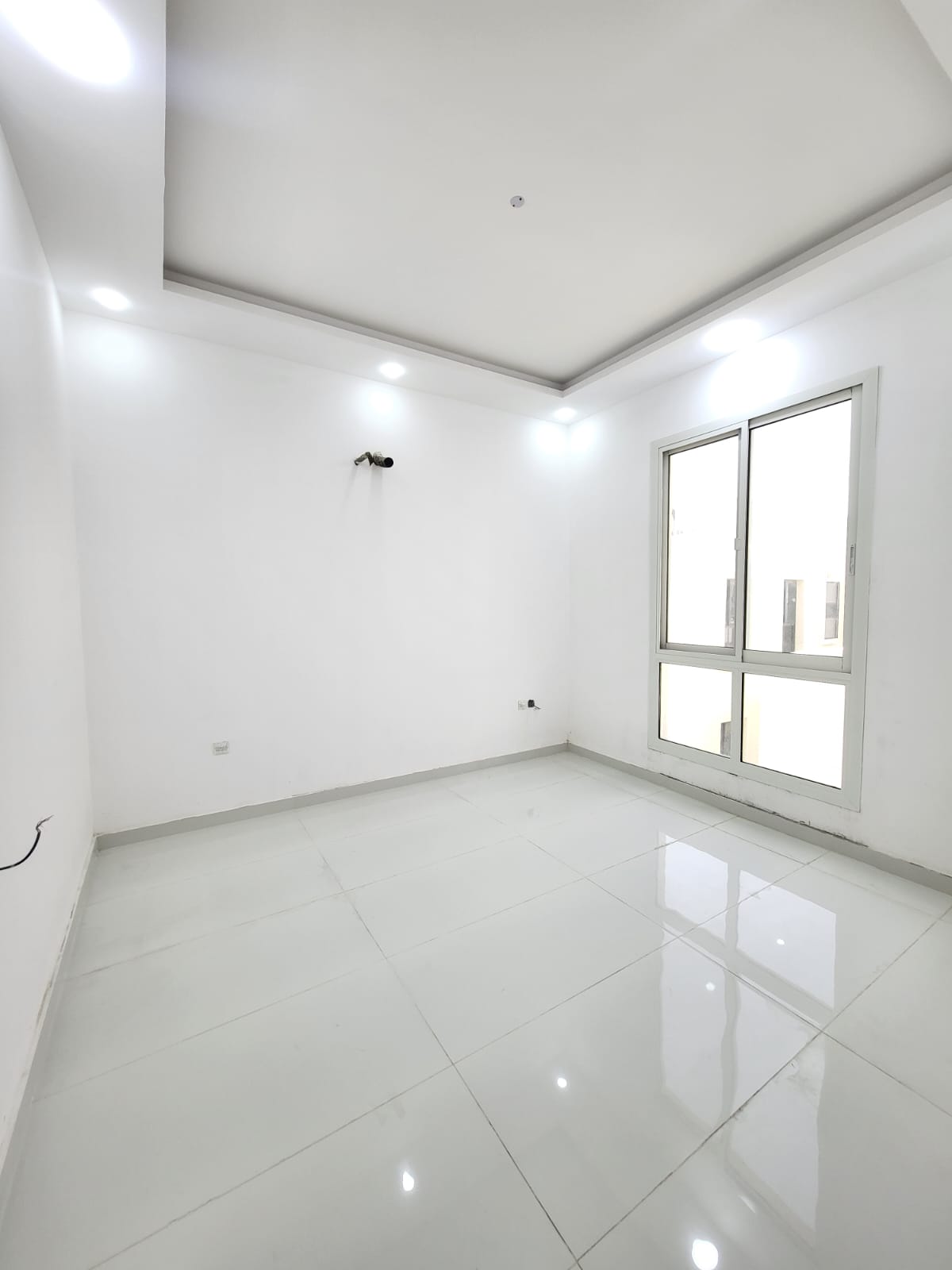Villa for sale in Al Yasmin neighborhood, Ajman, with a modern design and distinctive features. 10