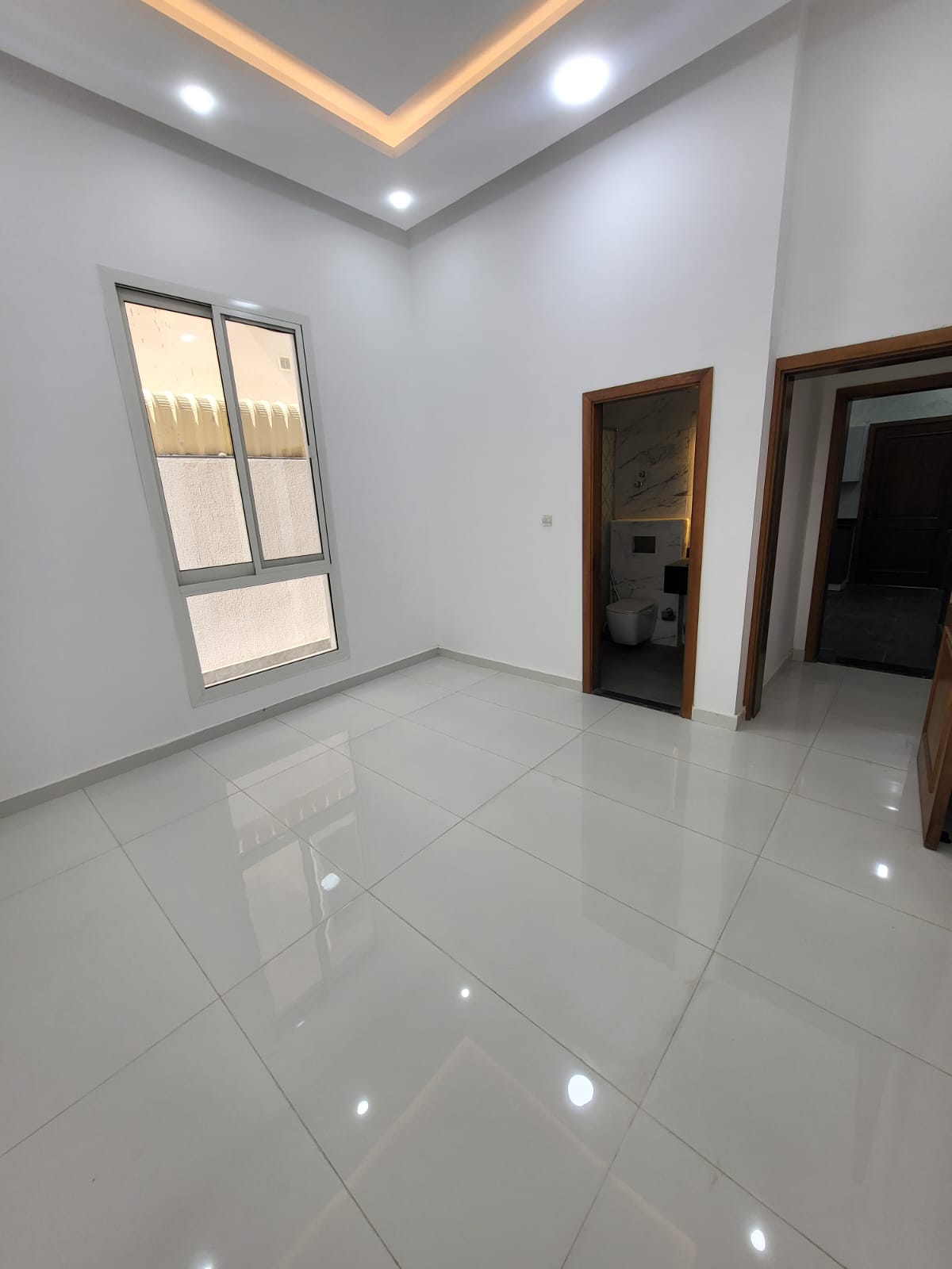 Villa for sale in Al Yasmin neighborhood, Ajman, with a modern design and distinctive features. 11